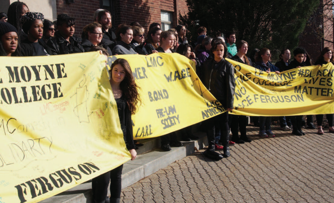 In May 2015, approximately 50 students, faculty, and administrators gathered outside of Grewen Hall, Le Moyne College , to express their solidarity in support of the people of Ferguson. Following a moment of silence, the group walked throughout the main academic complex before reconvening outside for prayer and reflection.