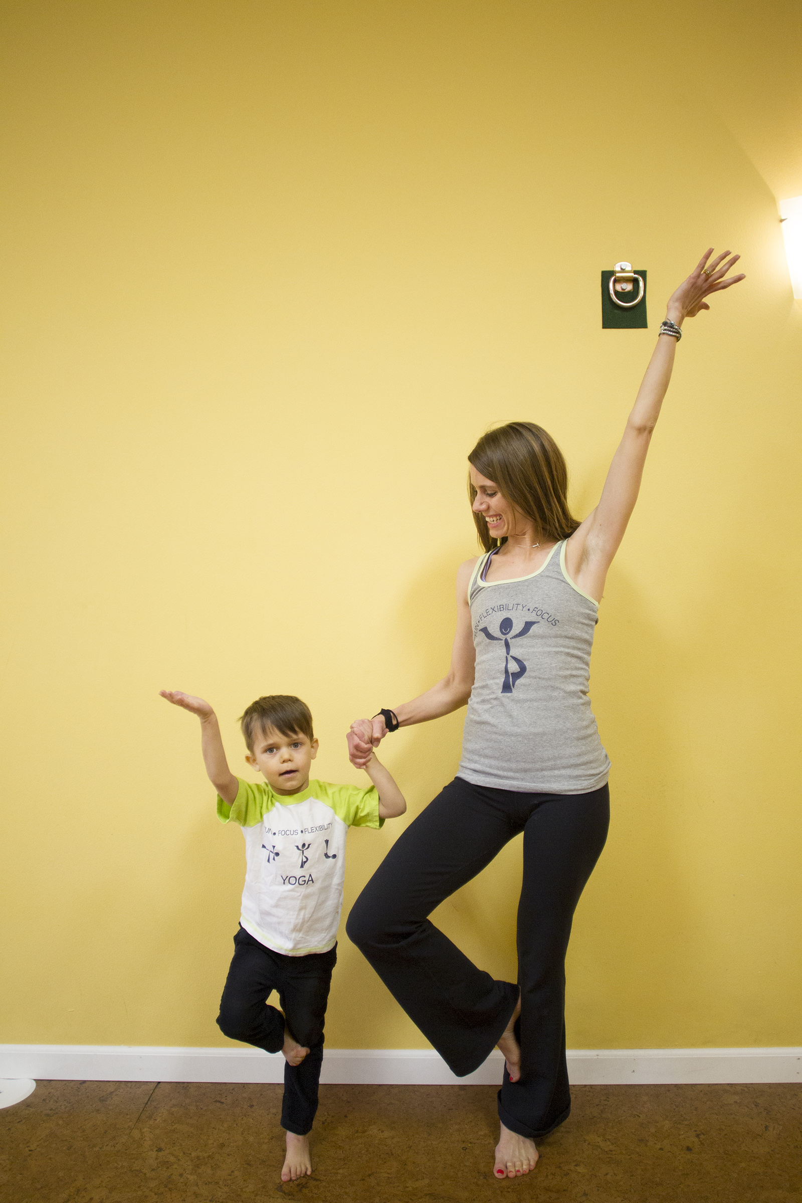  Dana Robinson poses with her son, Tymen, at Sweet Feet Yoga. 