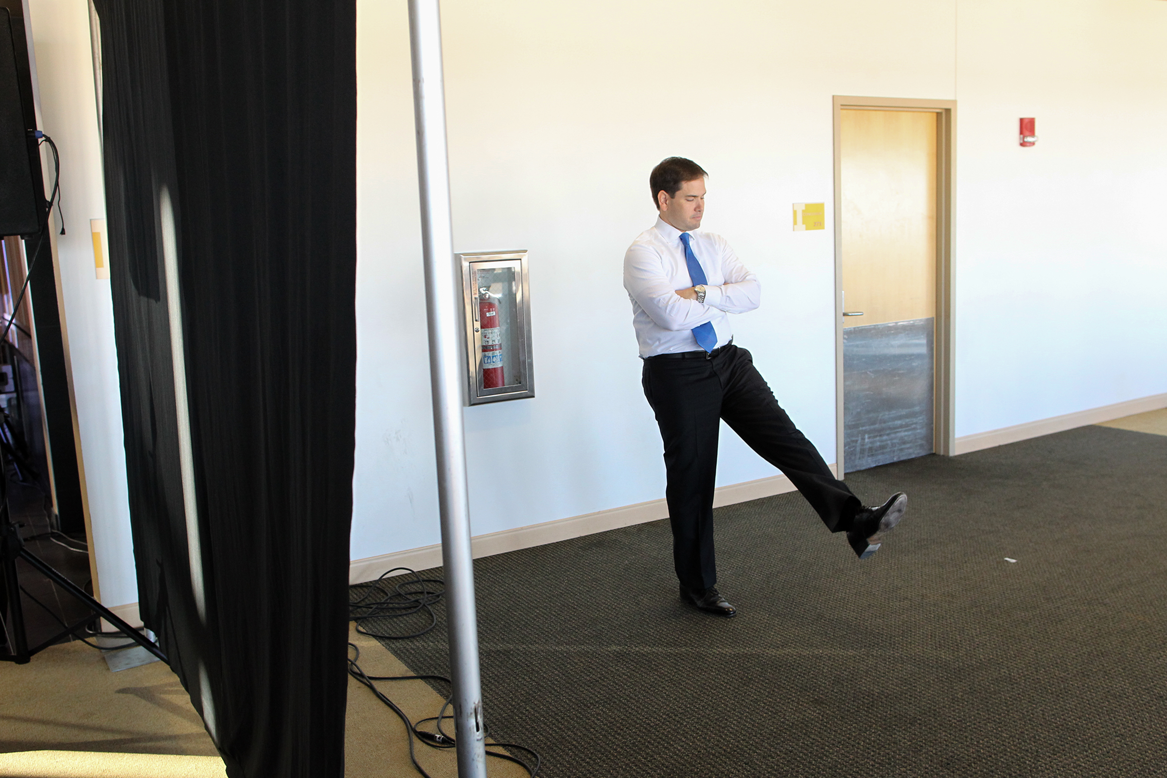 Republican presidential candidate Marco Rubio waits to be introduced to guests at Kinnick Stadium.