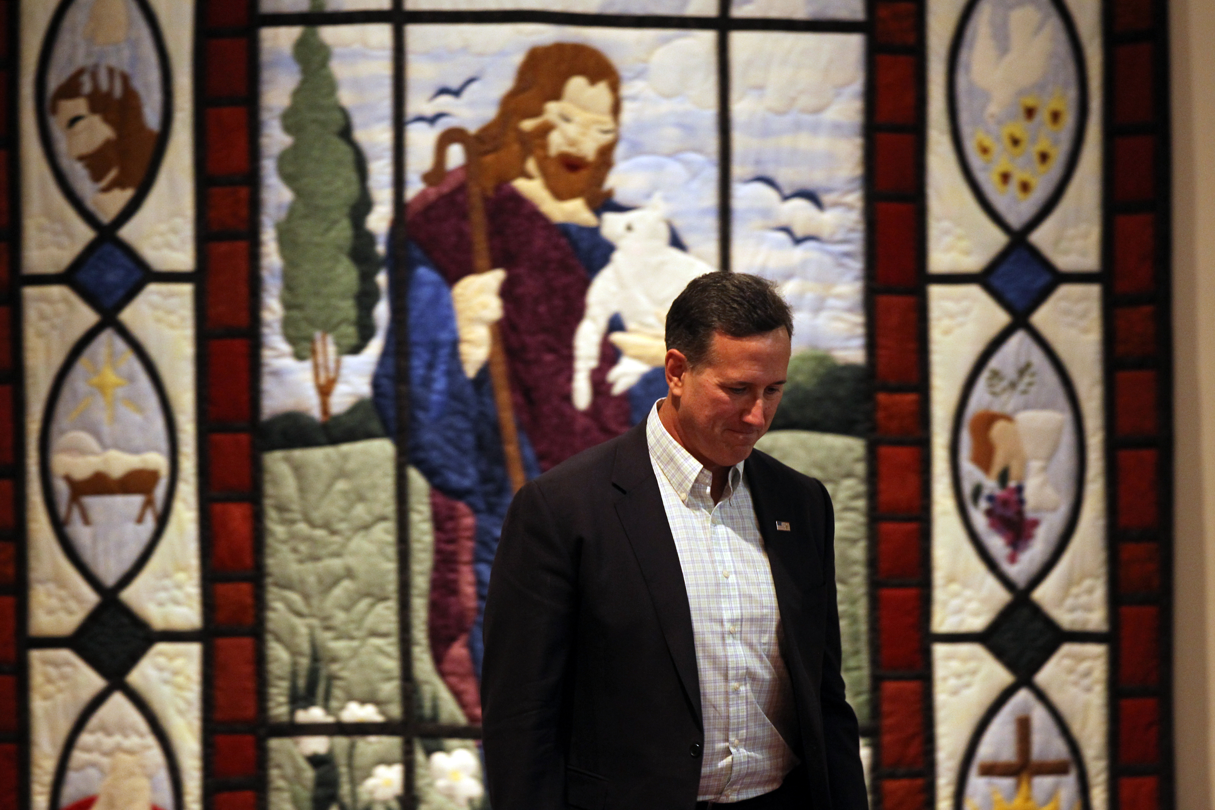 Republican presidential candidate Rick Santorum is introduced at Grace Fellowship Church.