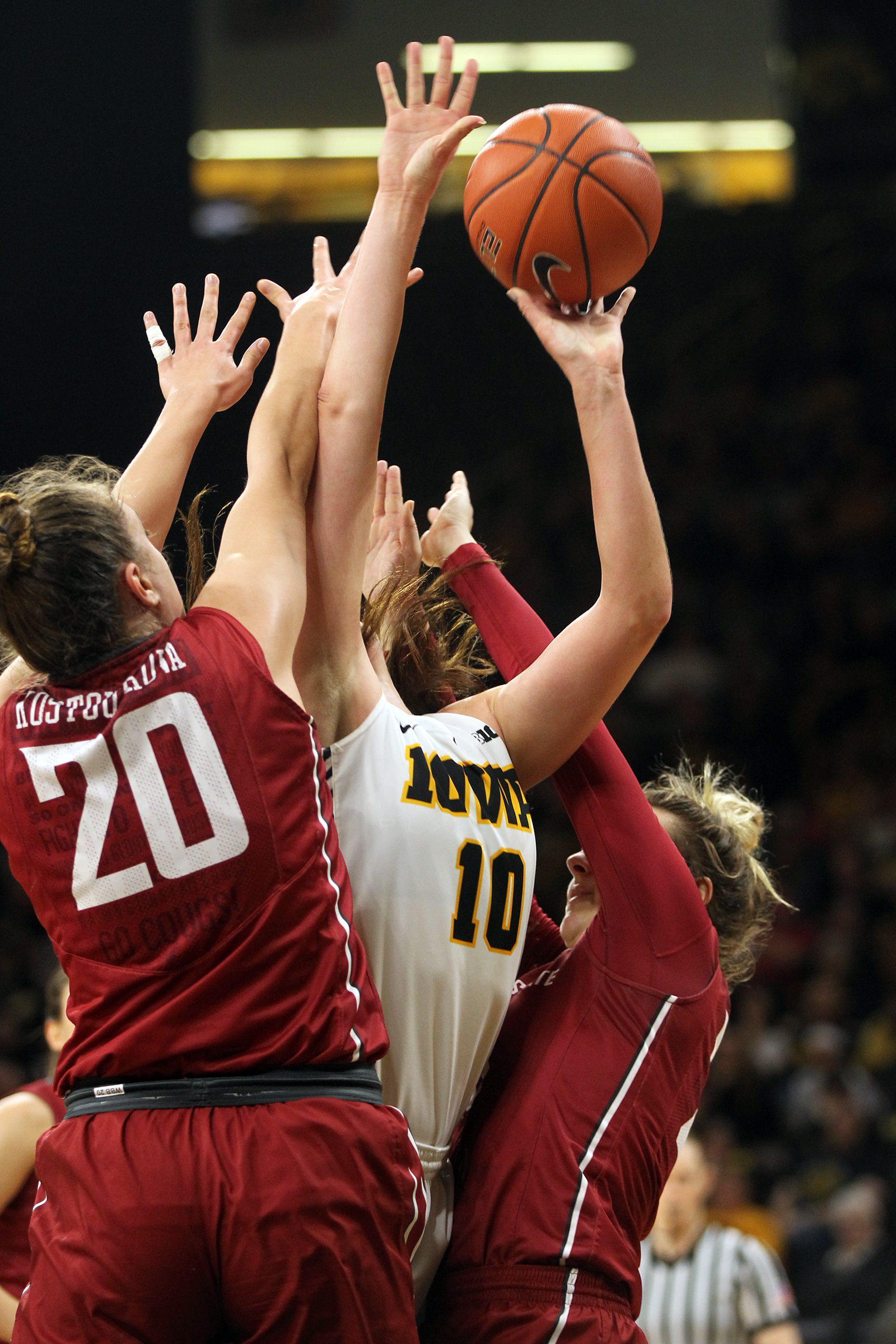  Iowa's Megan Gustafson takes a contested shot during the Hawkeyes' WNIT Elite Eight game against Washington State at Carver-Hawkeyes Arena. 