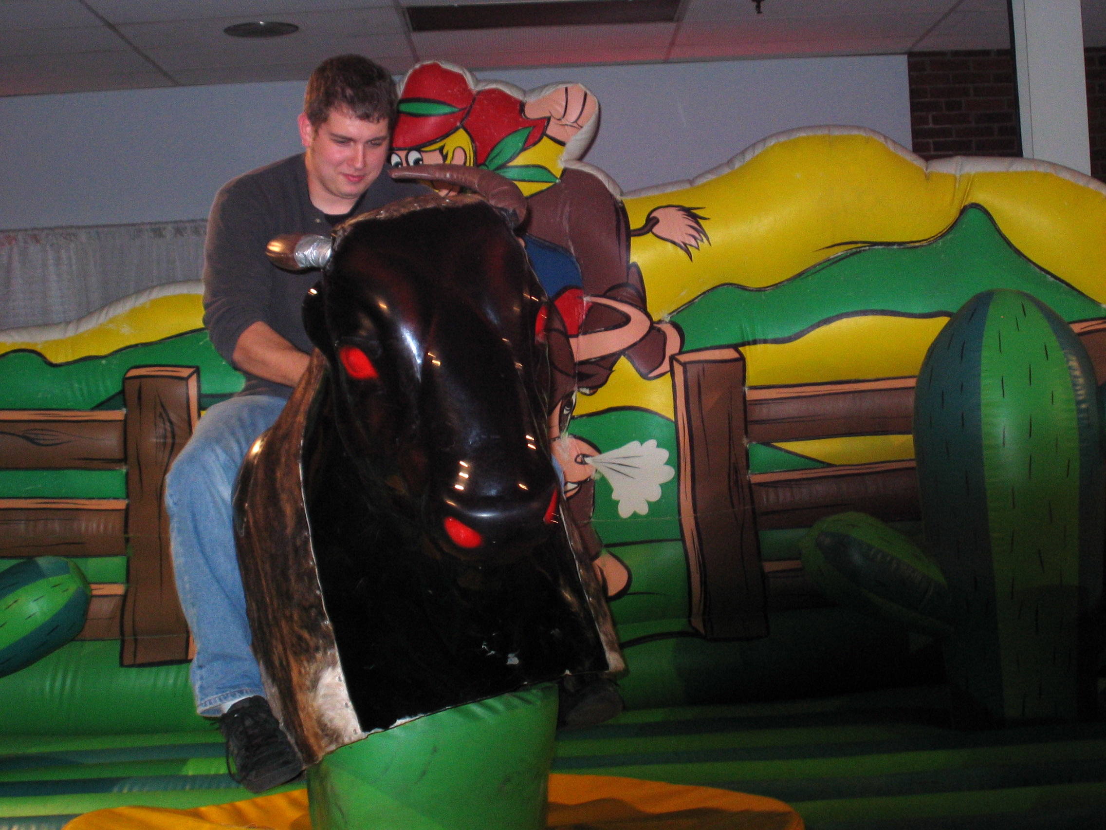 Mechanical bull riding