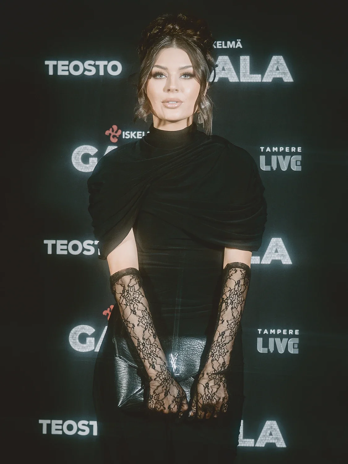 Finnish singer-songwriter Rita Behm poses for press on the red carpet at Iskelmä Gaala. Nokia Arena, Tampere.