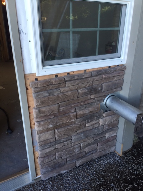 The new stone facade. The only thing left it trim! 