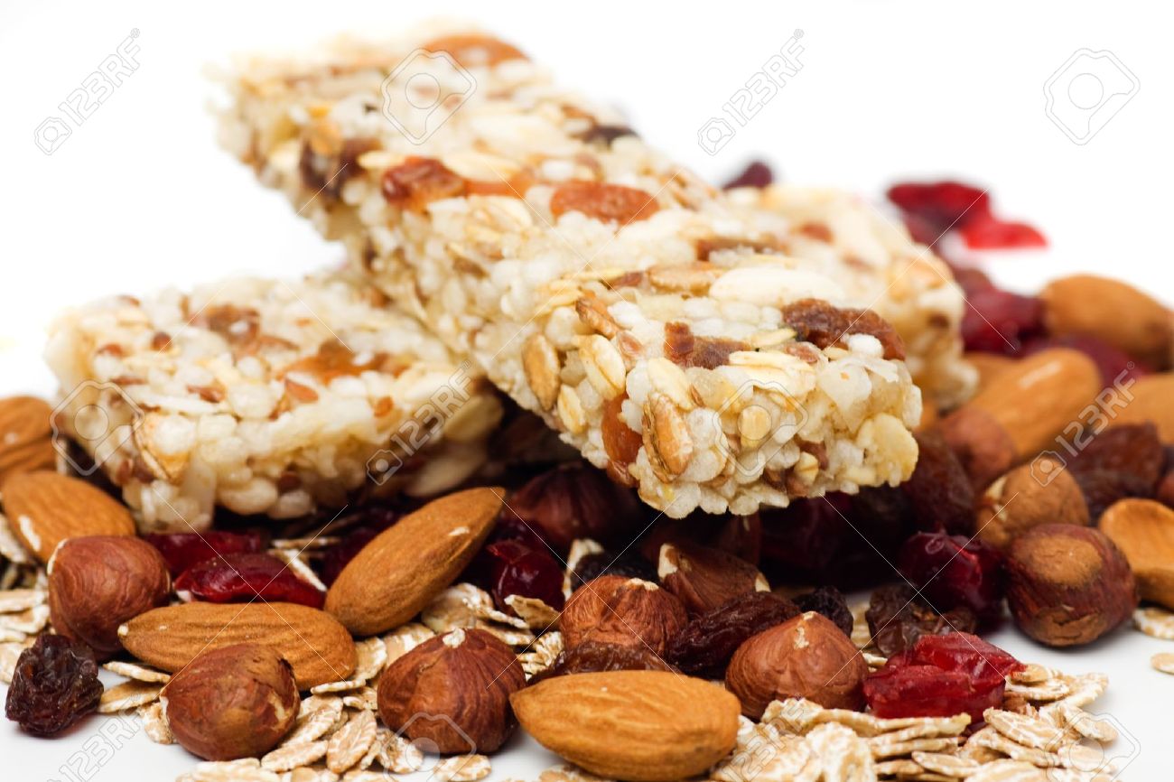 7422128-Granola-bar-with-dried-fruit-and-nuts-on-white-background-Stock-Photo.jpg