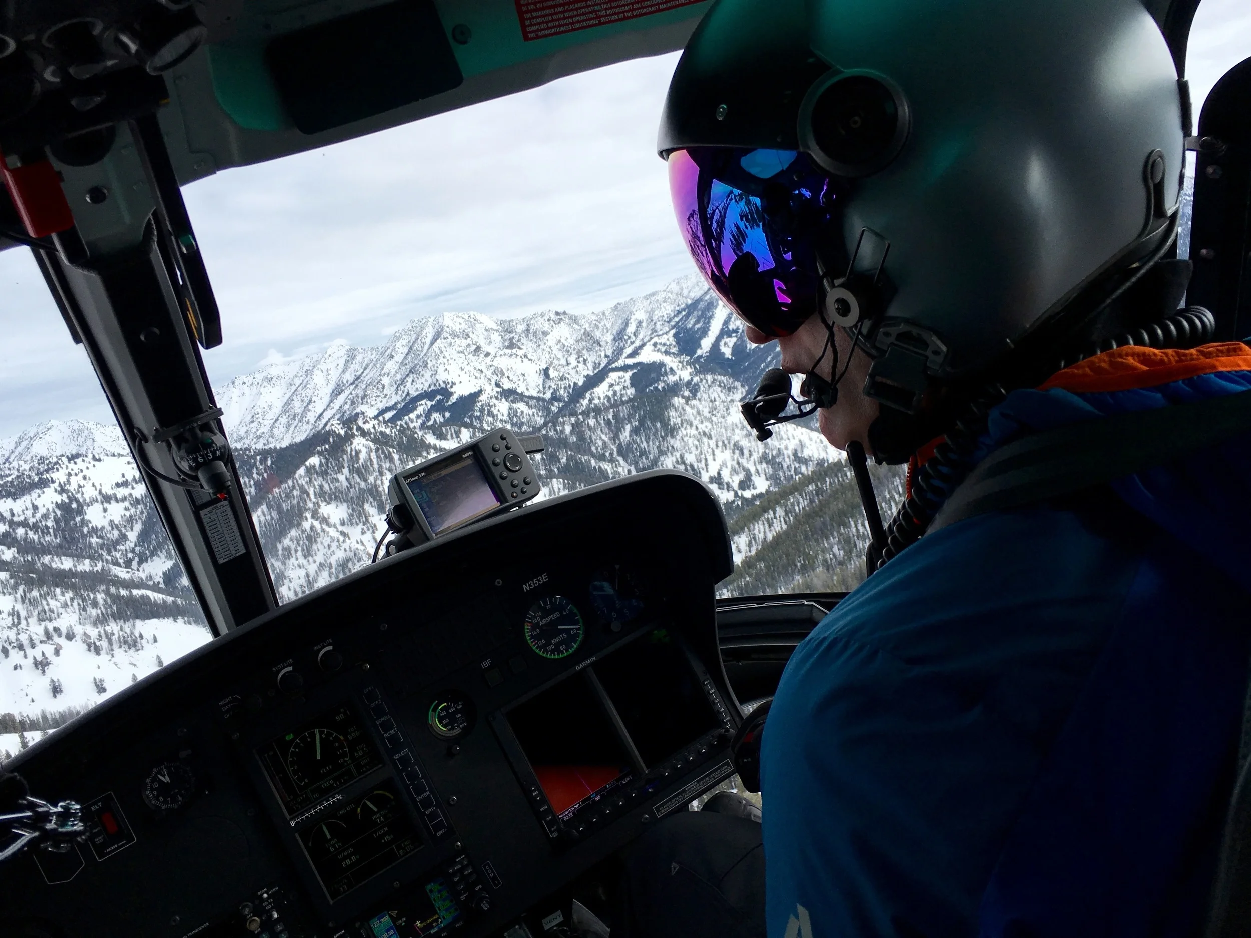SVHS pilot Chris Templeton spots a landing zone atop an Idaho peak.