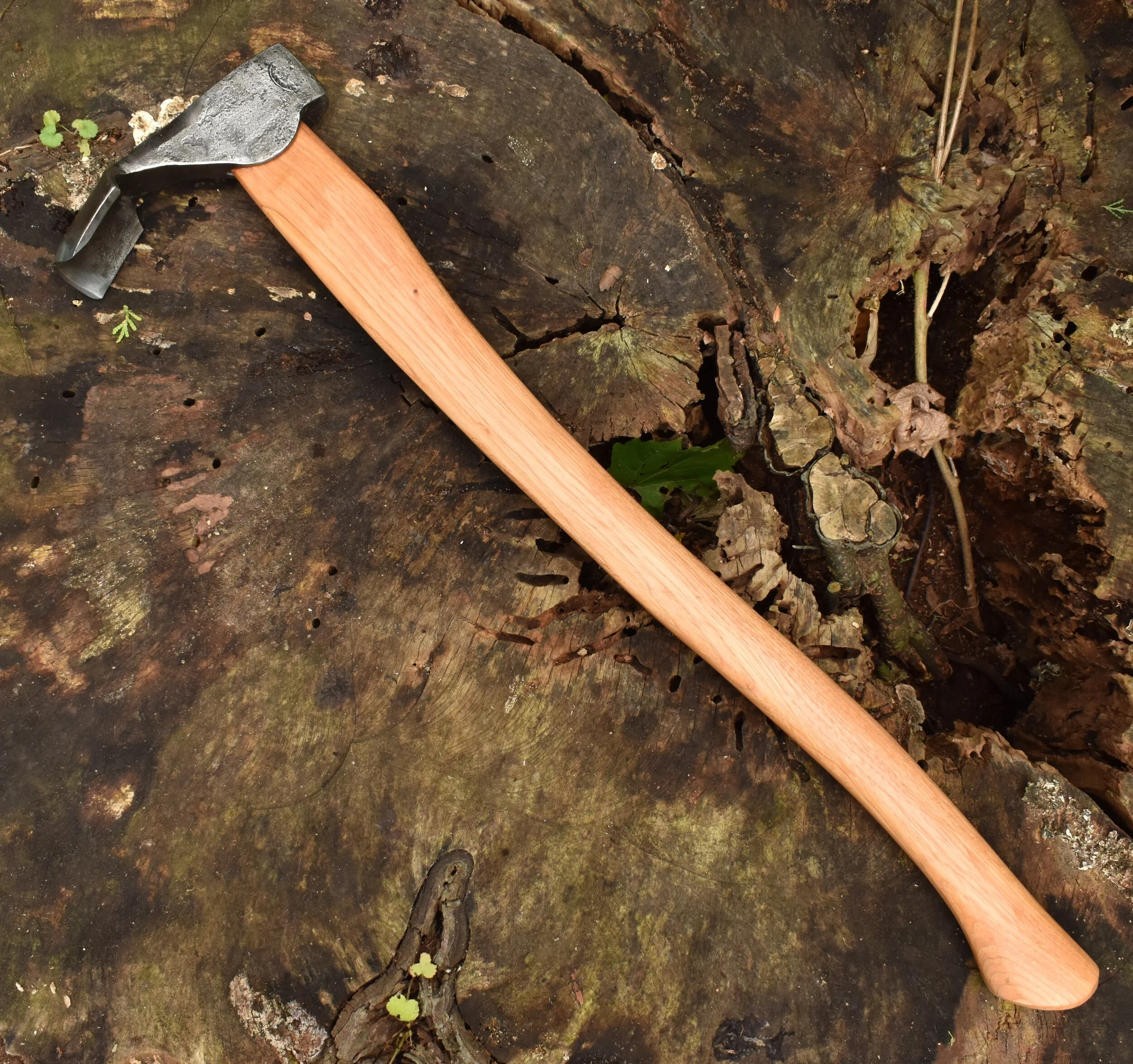 adze-toronto-blacksmith-gutter-timber-framing-log-building.jpg