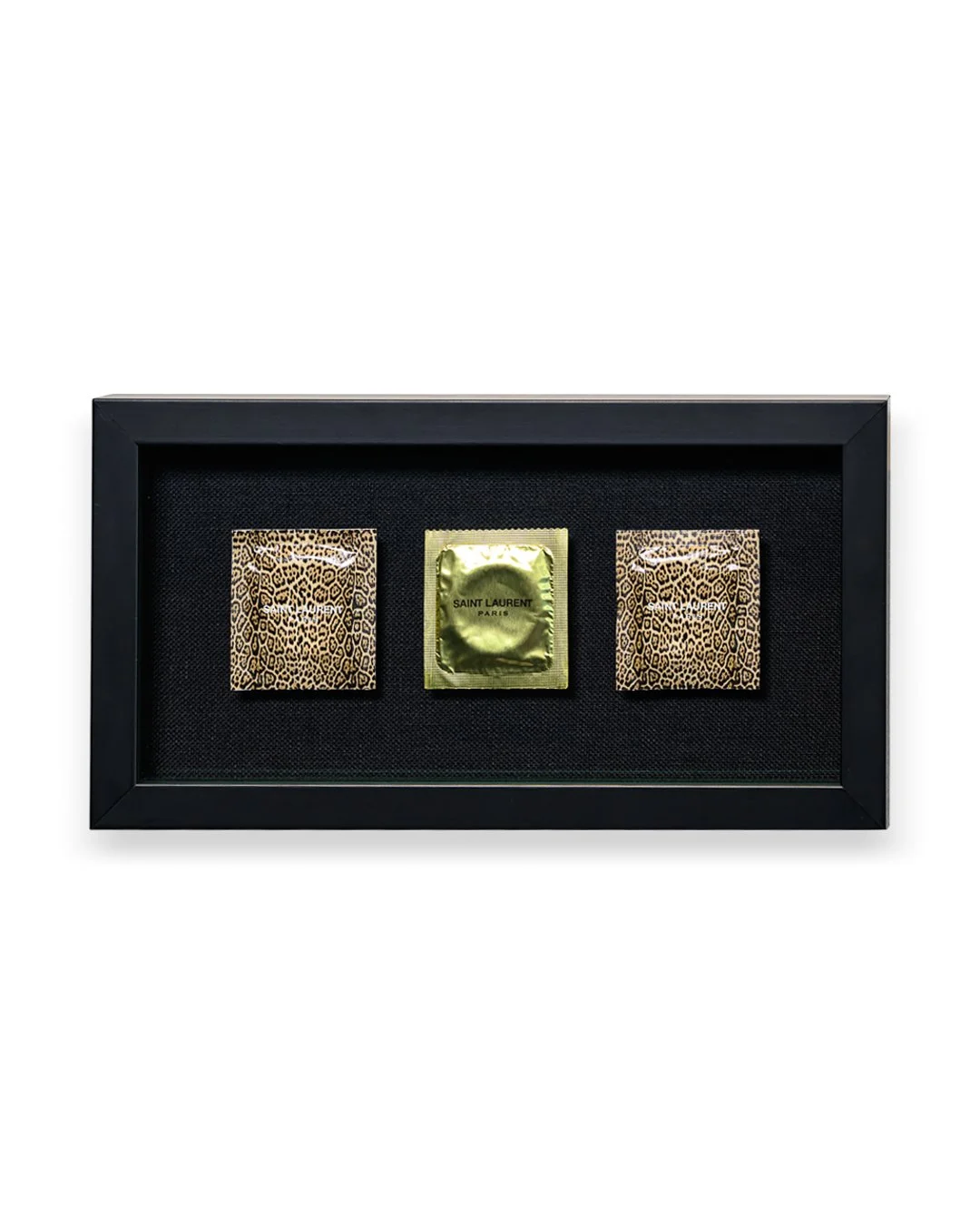 saint laurent condoms framed in black shadowbox-.jpg