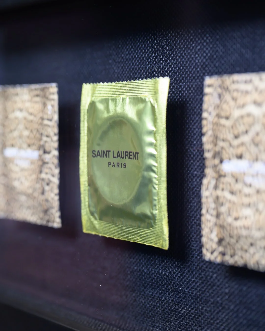 saint laurent condoms framed in black shadowbox-87714.jpg