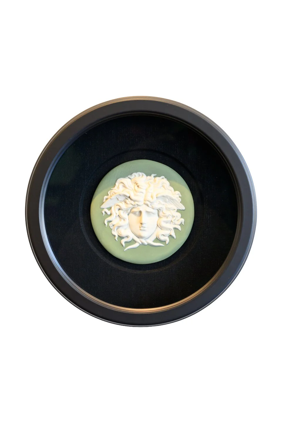 Round Jasperware Medusa Gorgon plaque in a custom black satin round frame with coarse black linen sink mat at a San Francisco frame shop