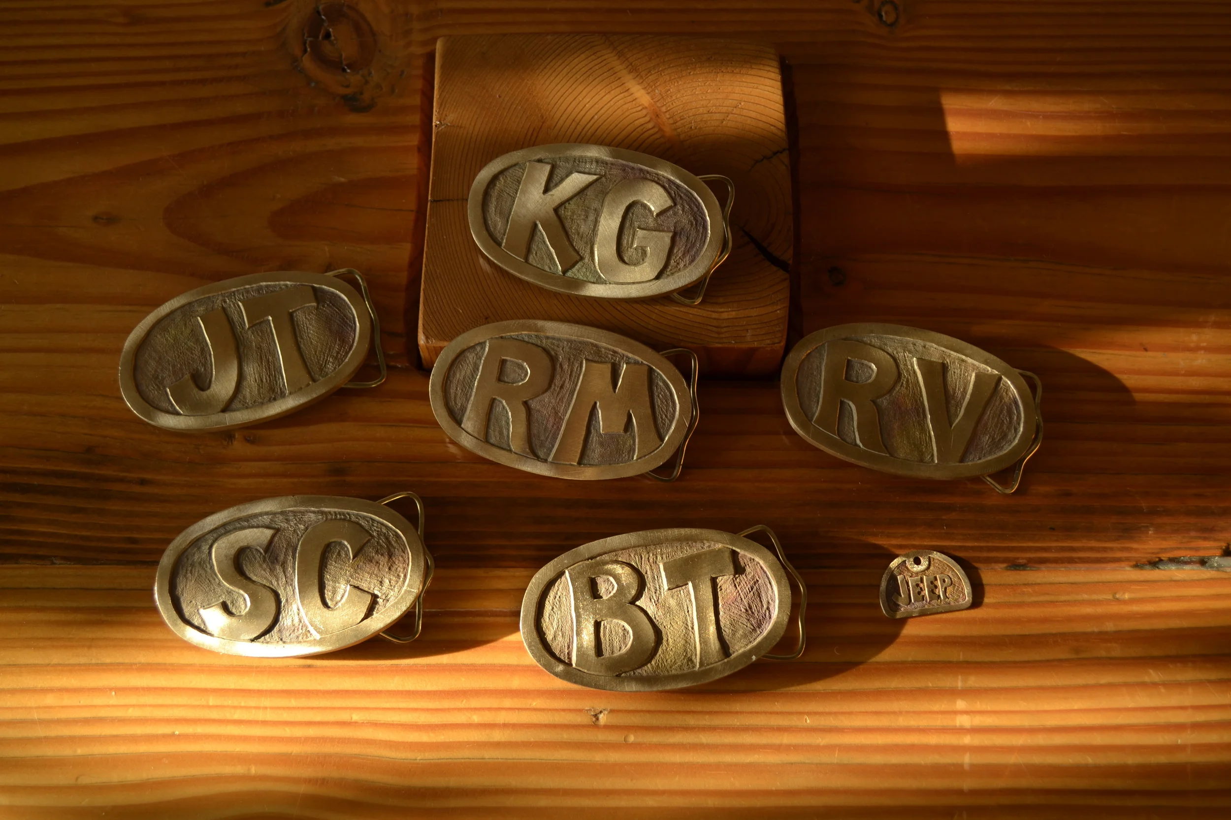 Hand carved, cast belt buckles.