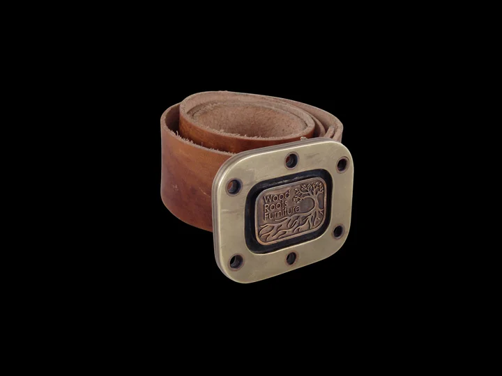 Custom made cast and fabricated belt buckle.