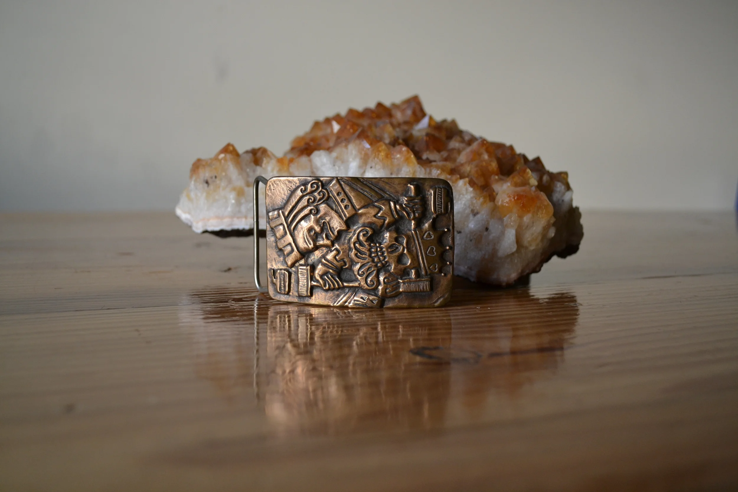 Hand carved, cast belt buckle.