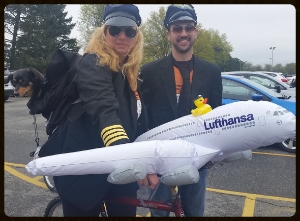 Heike von Maydell with co-pilot in backpack and Victor to right.