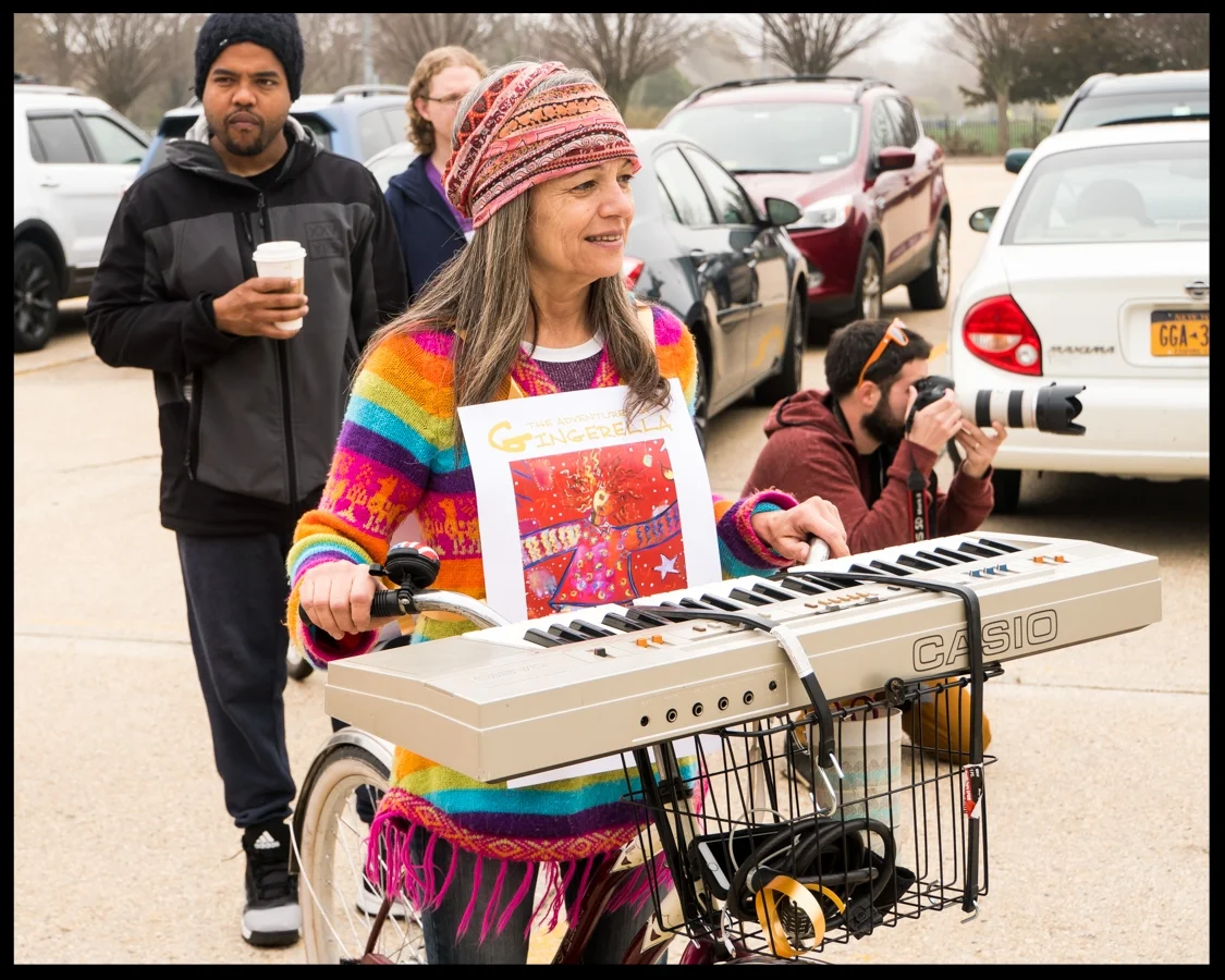 Third prize winner Kelly Schmidt with her Hippie-Chick Keyboardist bicycle float. (Photo credit, Amy Frushour Kelly)