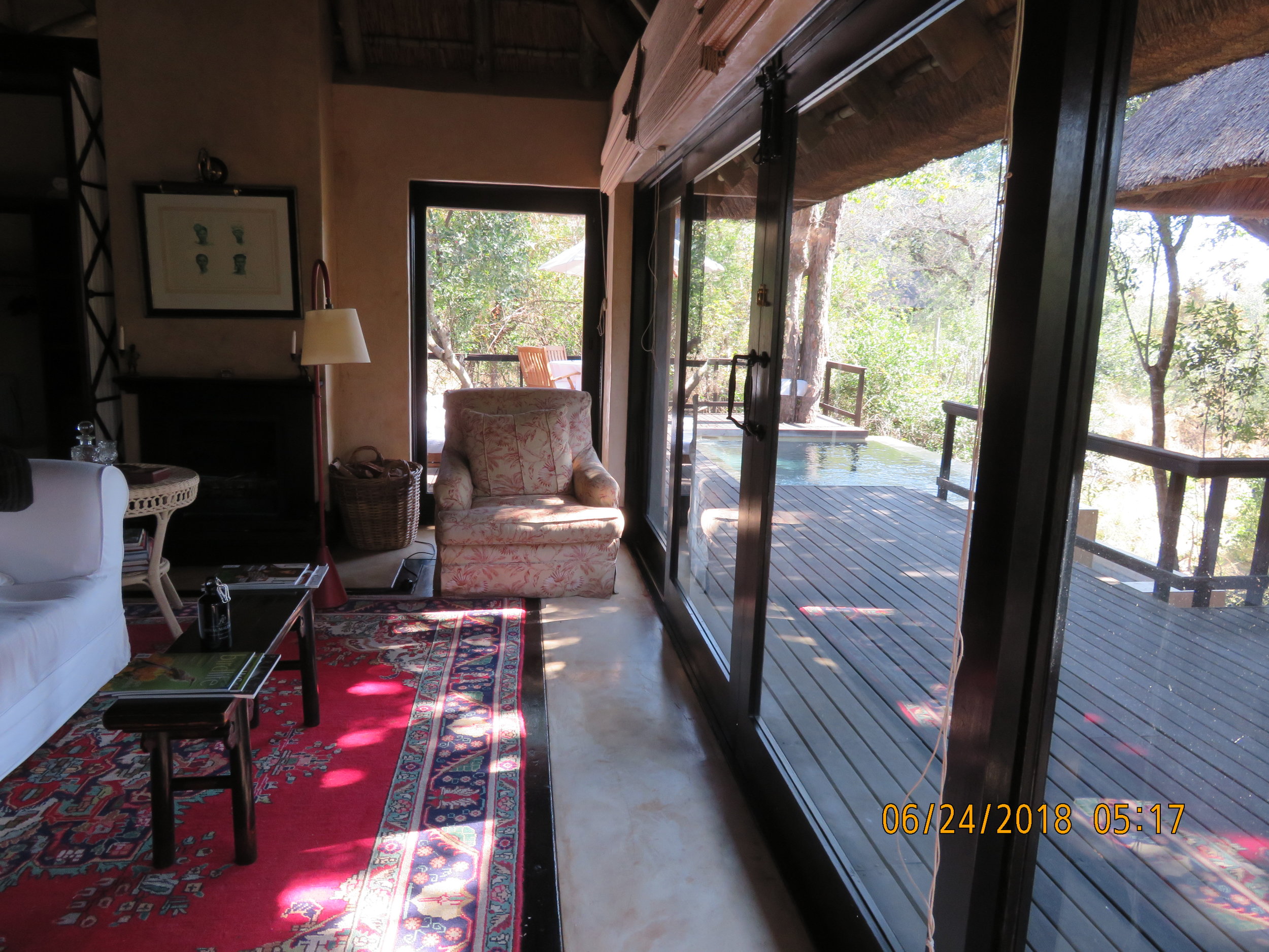 Sitting Room and Deck and pool .JPG