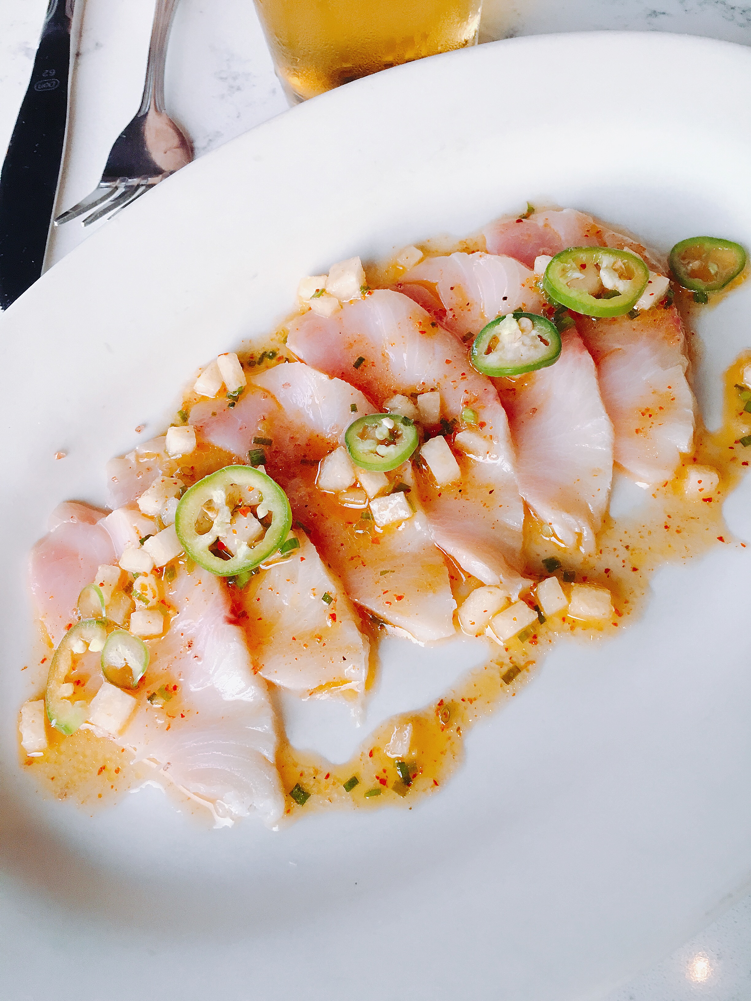 Hamachi Crudo, espellette, Asian pear, serrano, and agave