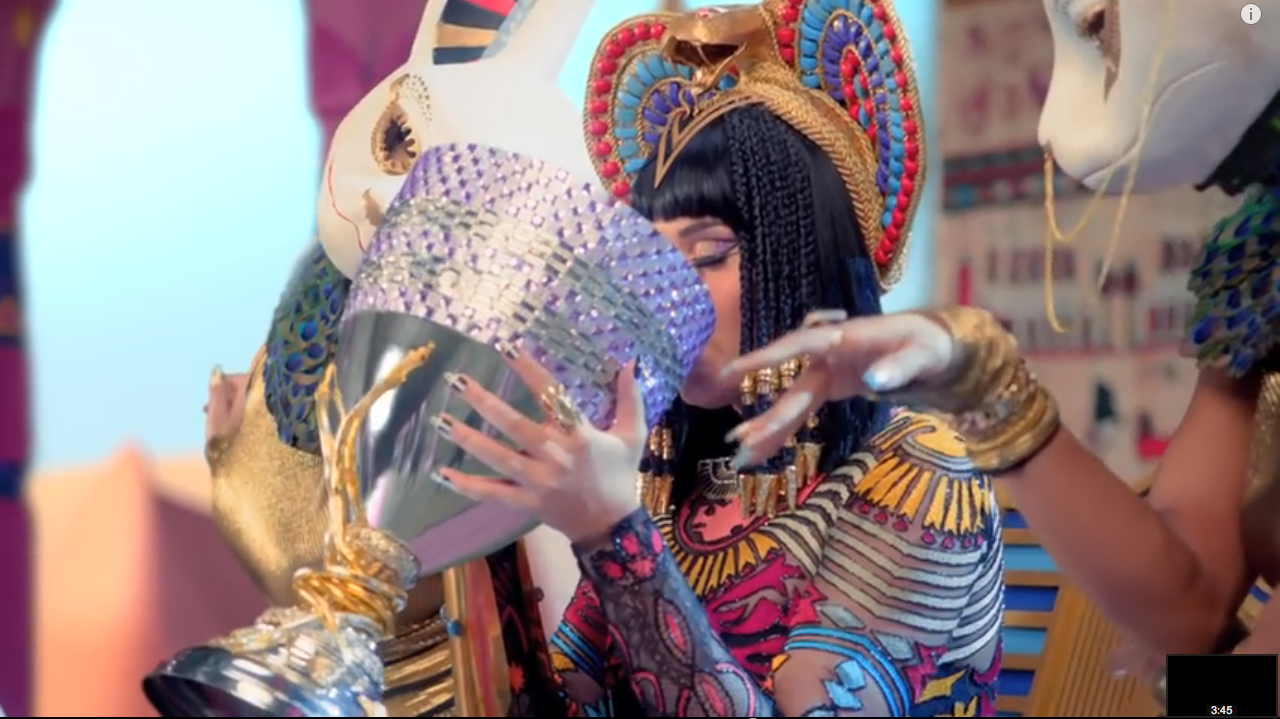 Queen Katy drinks a big gulp of soul. (IMAGE_25)