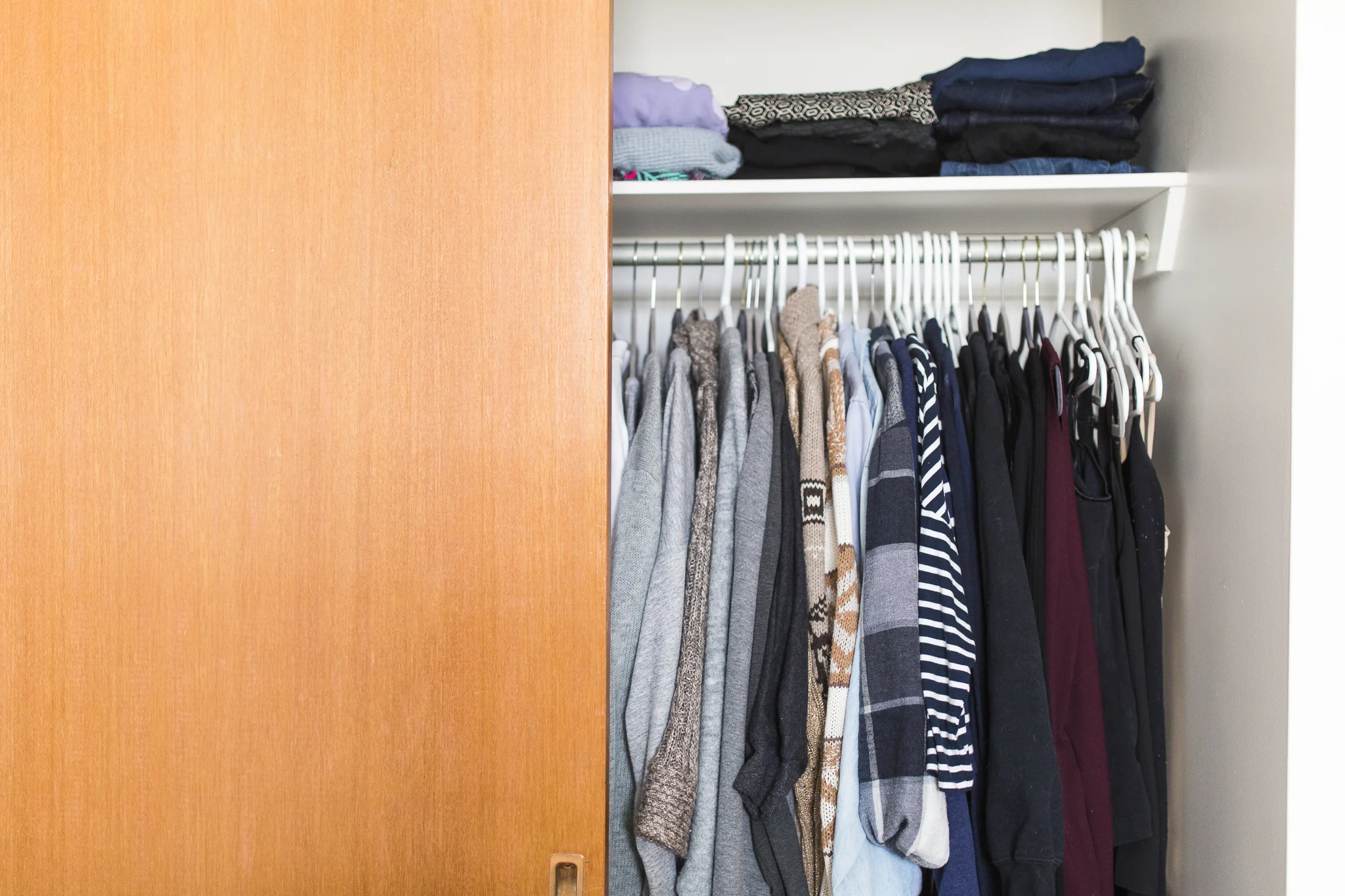 Nursing capsule wardrobe: cozy sweaters, cotton tops, nursing tank tops, leggings, stretchy jeans, etc.
