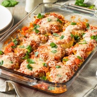 EGGPLANT PARMESAN 
I have to admit my family is not crazy about eggplant!  But I totally won them over with this classic northern Italian recipe!  By layering eggplant (roasted, not fried!) with Parmesan and a simple tomato sauce, you get an absolute