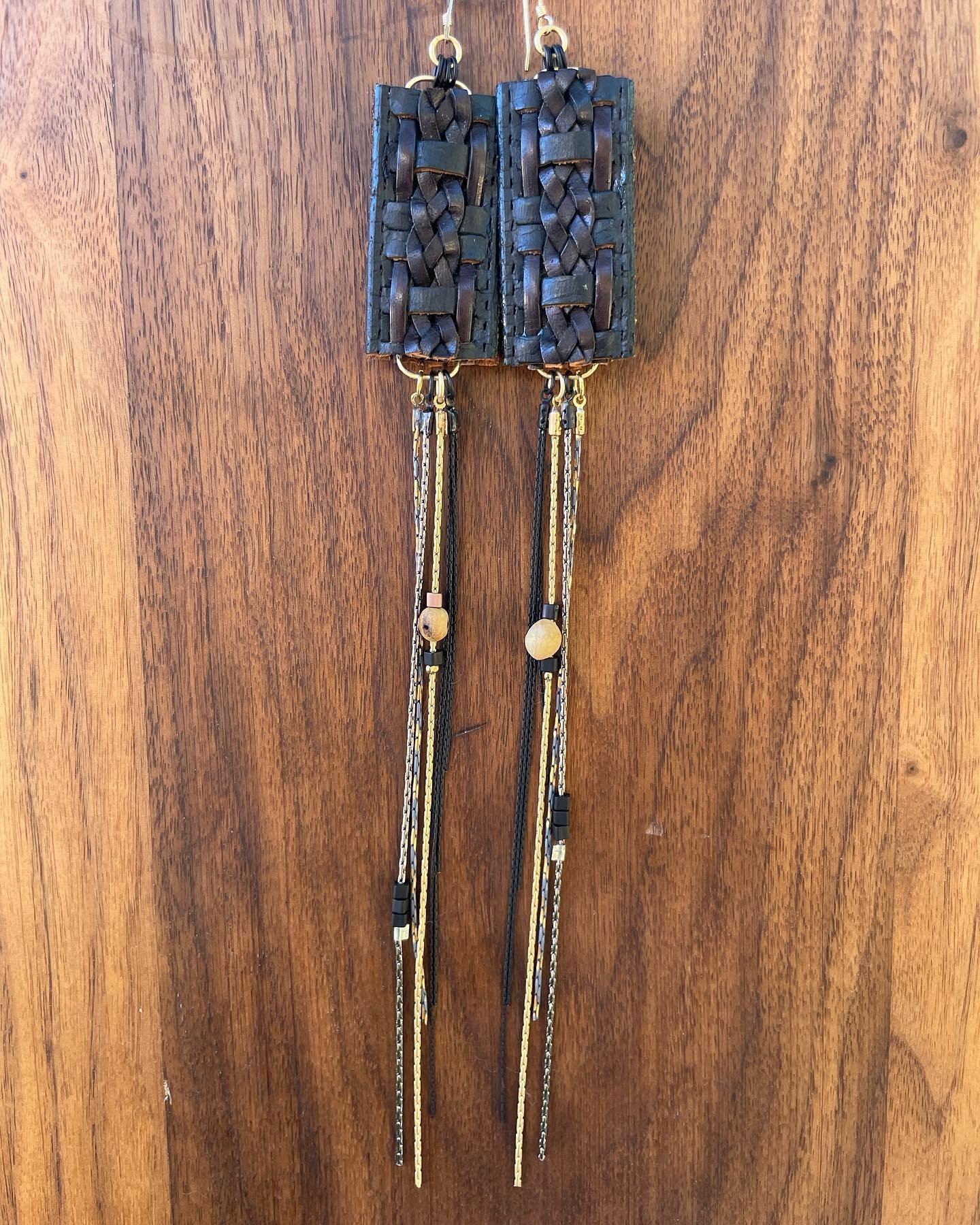 Reflecting on this epic pair &bull;~&bull;
Repurposed Leather Belt Earrings with
Palo Santo beads &amp; long chain fringe. 
|||&bull;~&bull;~&bull;~&bull;~&bull;~&bull;~&bull;~&bull;~&bull;~&bull;~&bull;~&bull;~&bull;~&bull;~&bull;~&bull;~&bull;~&bul
