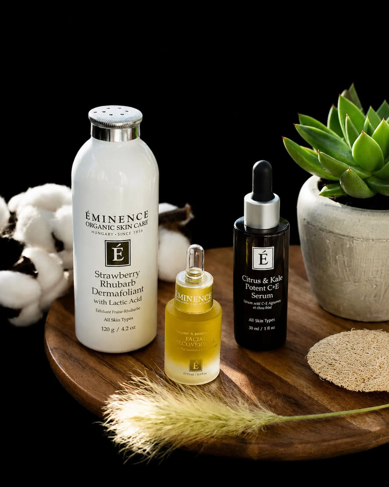 Éminence Organic Skincare products including Strawberry Rhubarb Dermafoliant, Facial Recovery Oil, and Citrus & Kale Serum