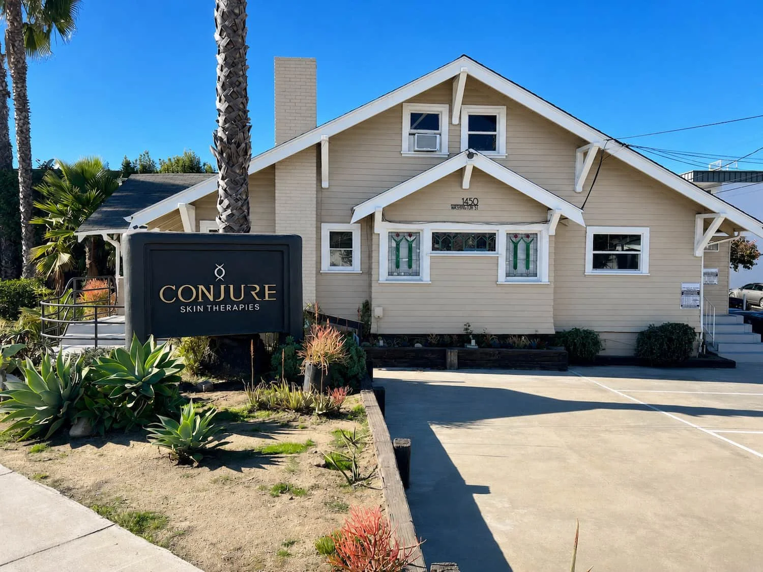 Front entrance and free on-site parking at Conjure Skin Therapies, 1450 Washington St, Hillcrest, San Diego