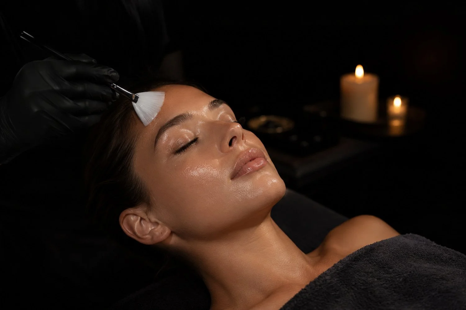 Esthetician applying a TCA chemical peel in San Diego