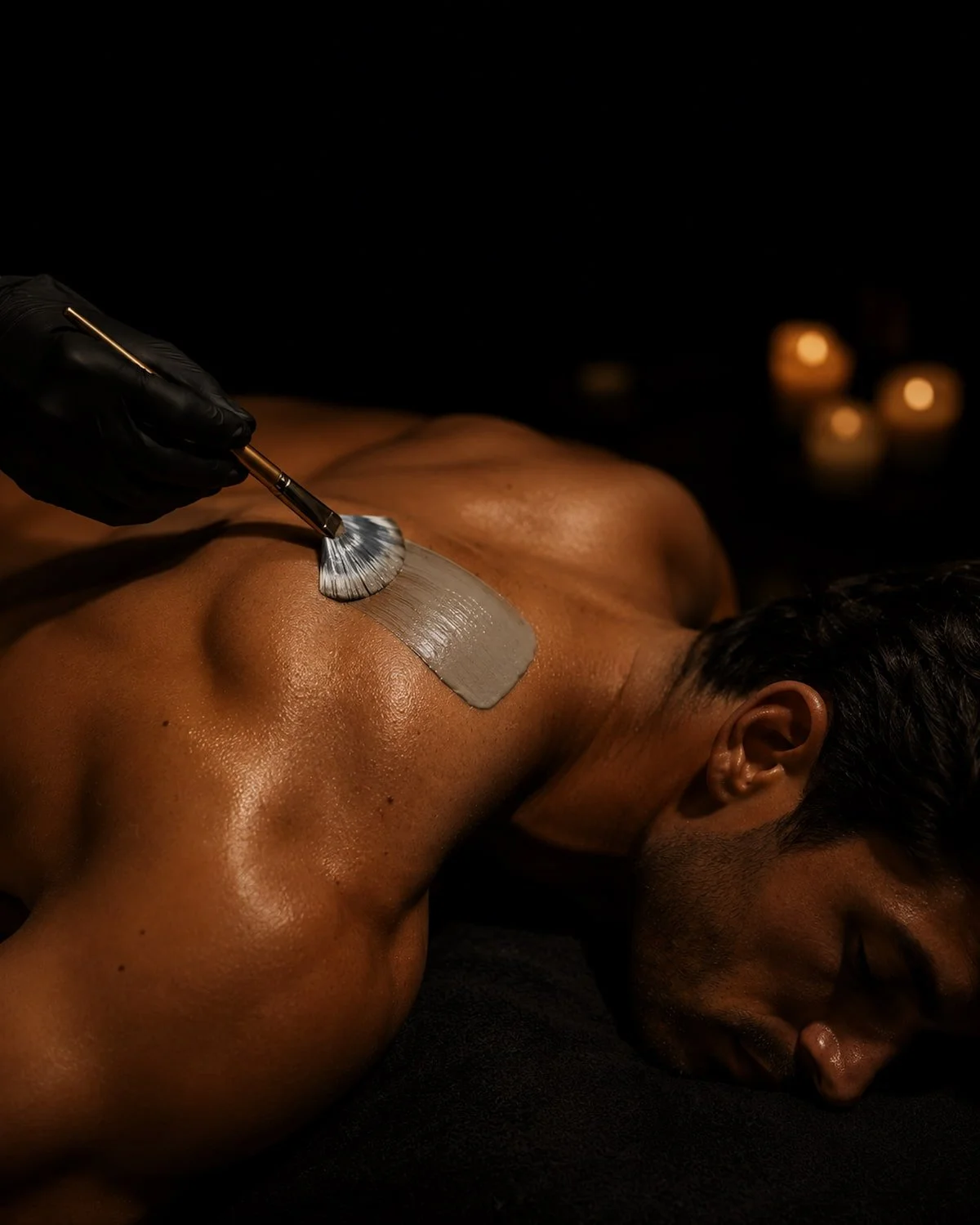 Man receiving a back facial treatment at a San Diego skin studio