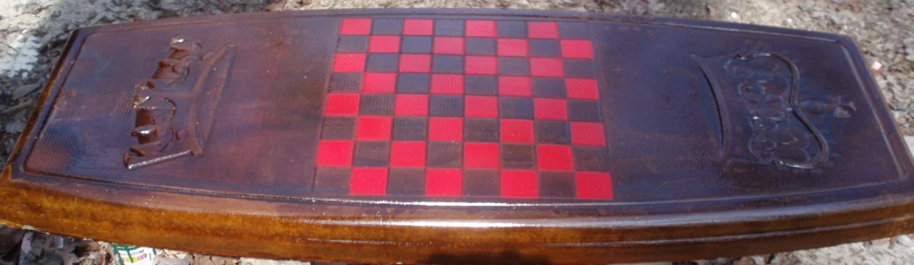 Concrete bench with checkers designed top. This what the mold will make