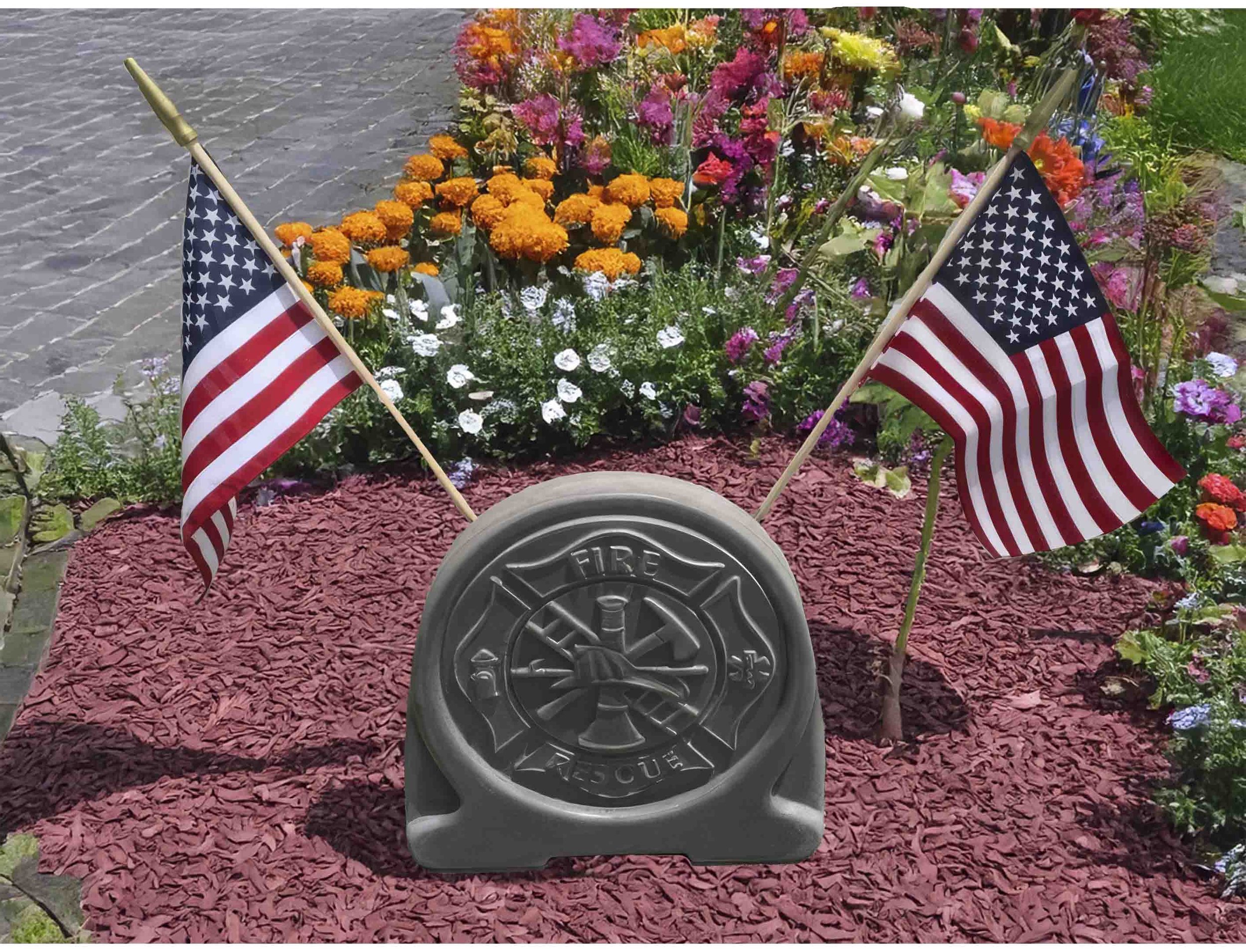 Standing garden stone mold with fireman design and flags