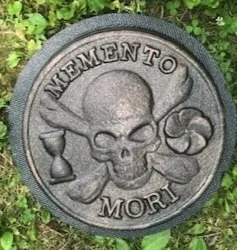 Concrete stepping stone mold with skull design for stoic designs