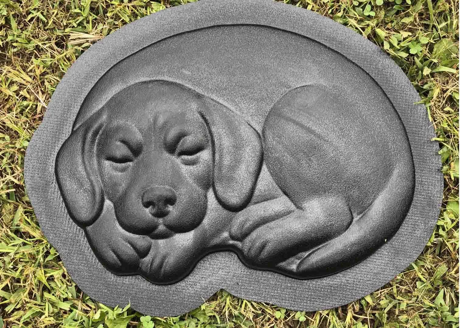 Sleeping dog decorative stepping stone for garden pathways and home decor
