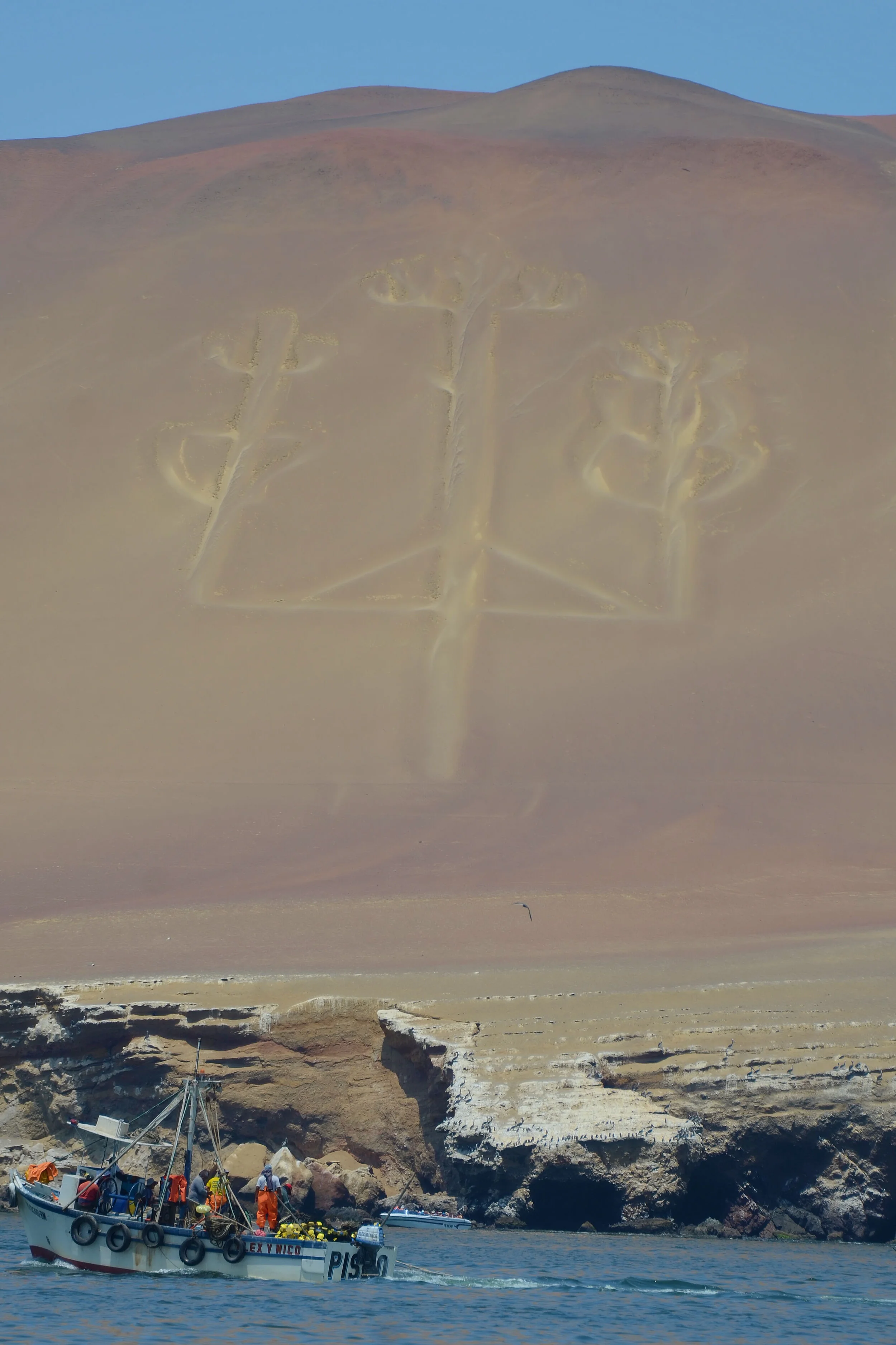  On the western slope of the Paracas Peninsula, within the Paracas National Reserve, a 200 m (656 ft) tall "Candelabro" was etched into the sand 2,000 years ago. Nobody knows why. The trenches are only 60 cm (2 ft) deep, but they survived two millenn