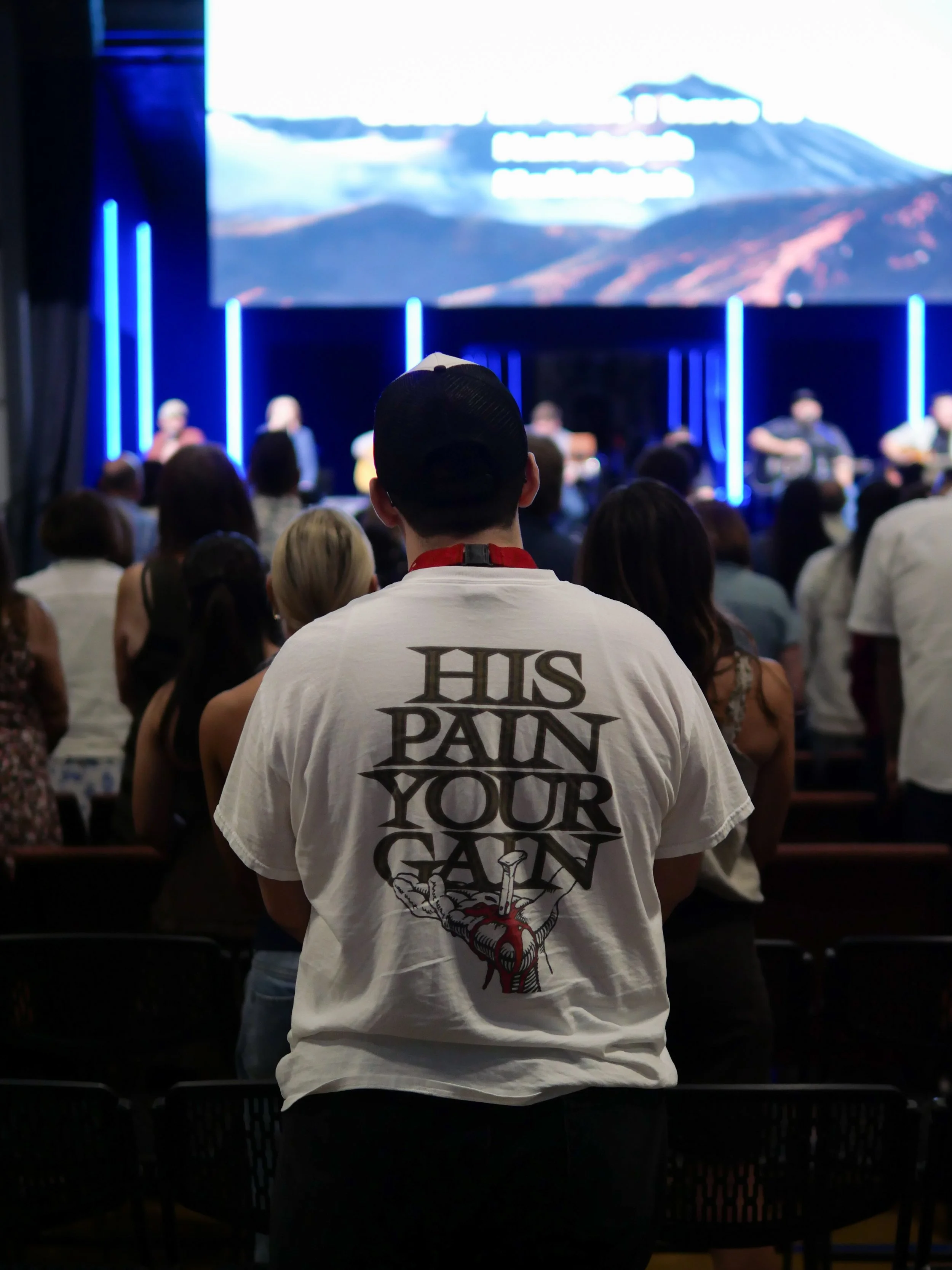 A man worshipping at our Sunday morning worship service.