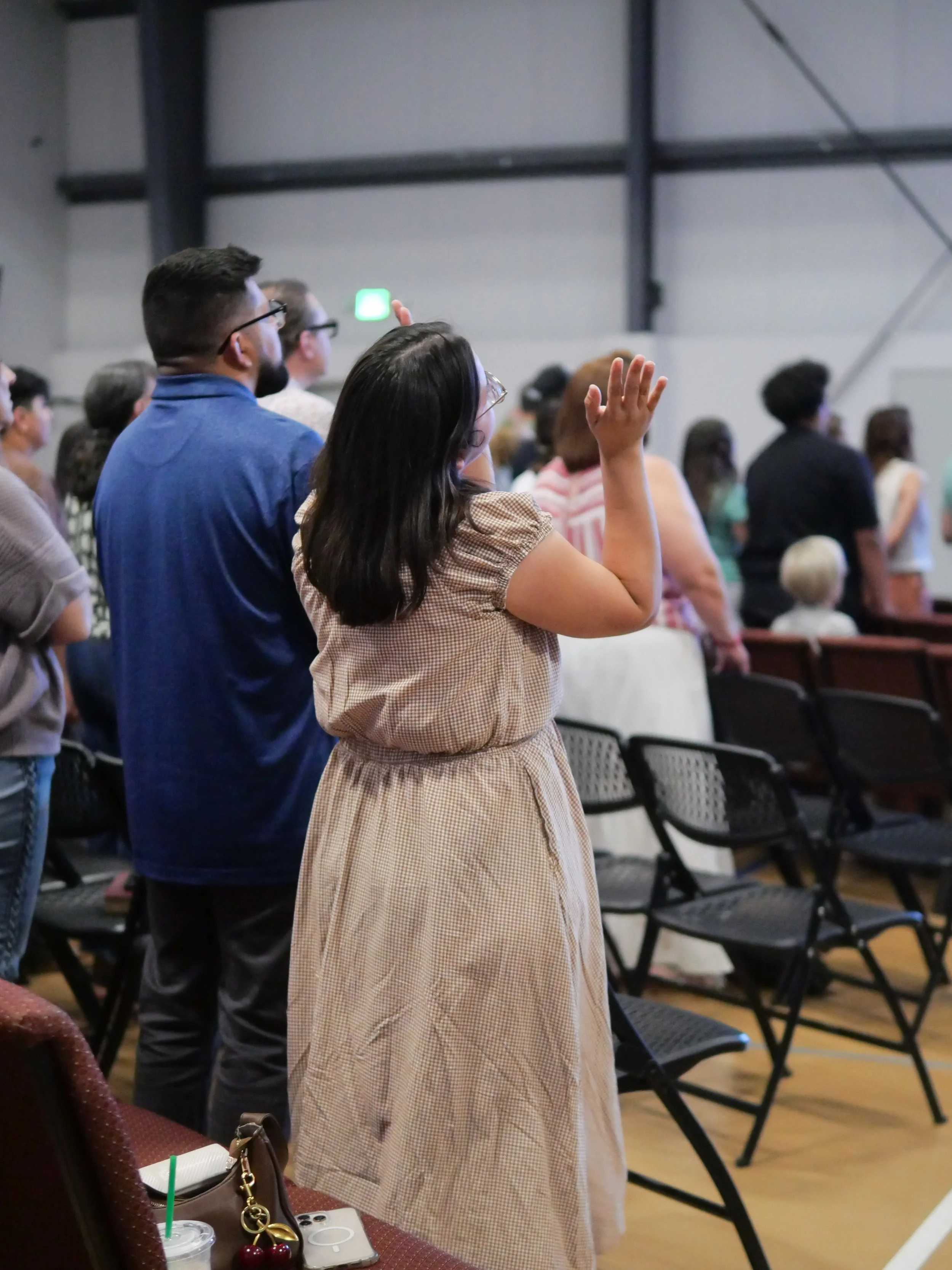 A group of people fellowshipping together after service.