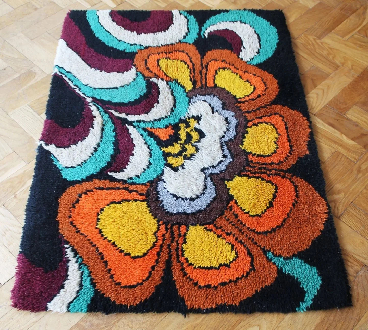 Hand-knotted wool rug from 1970s Germany with iconic pattern.jpg