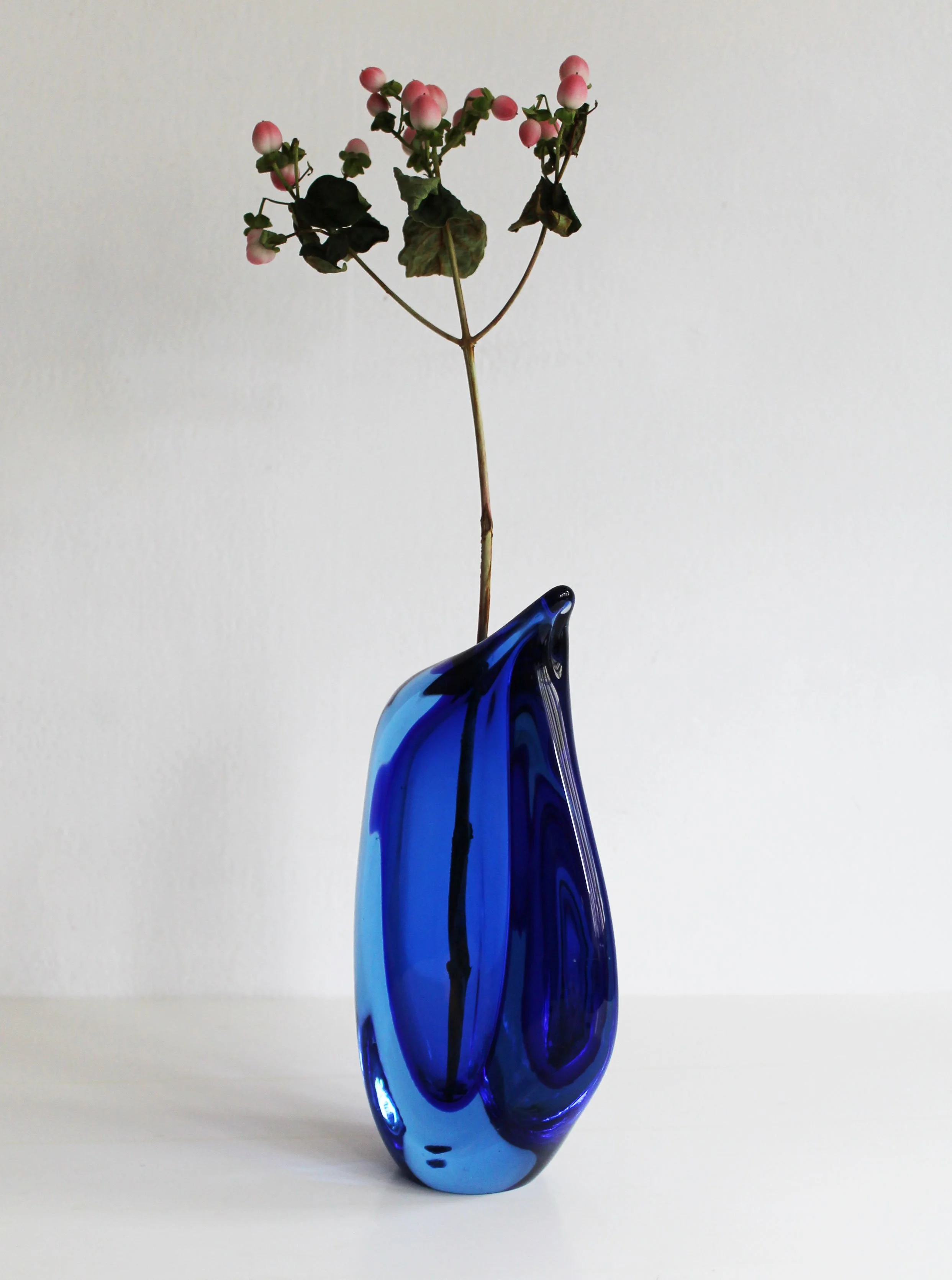 Elegant sculptural glass vase from Czech mid-century era.jpg