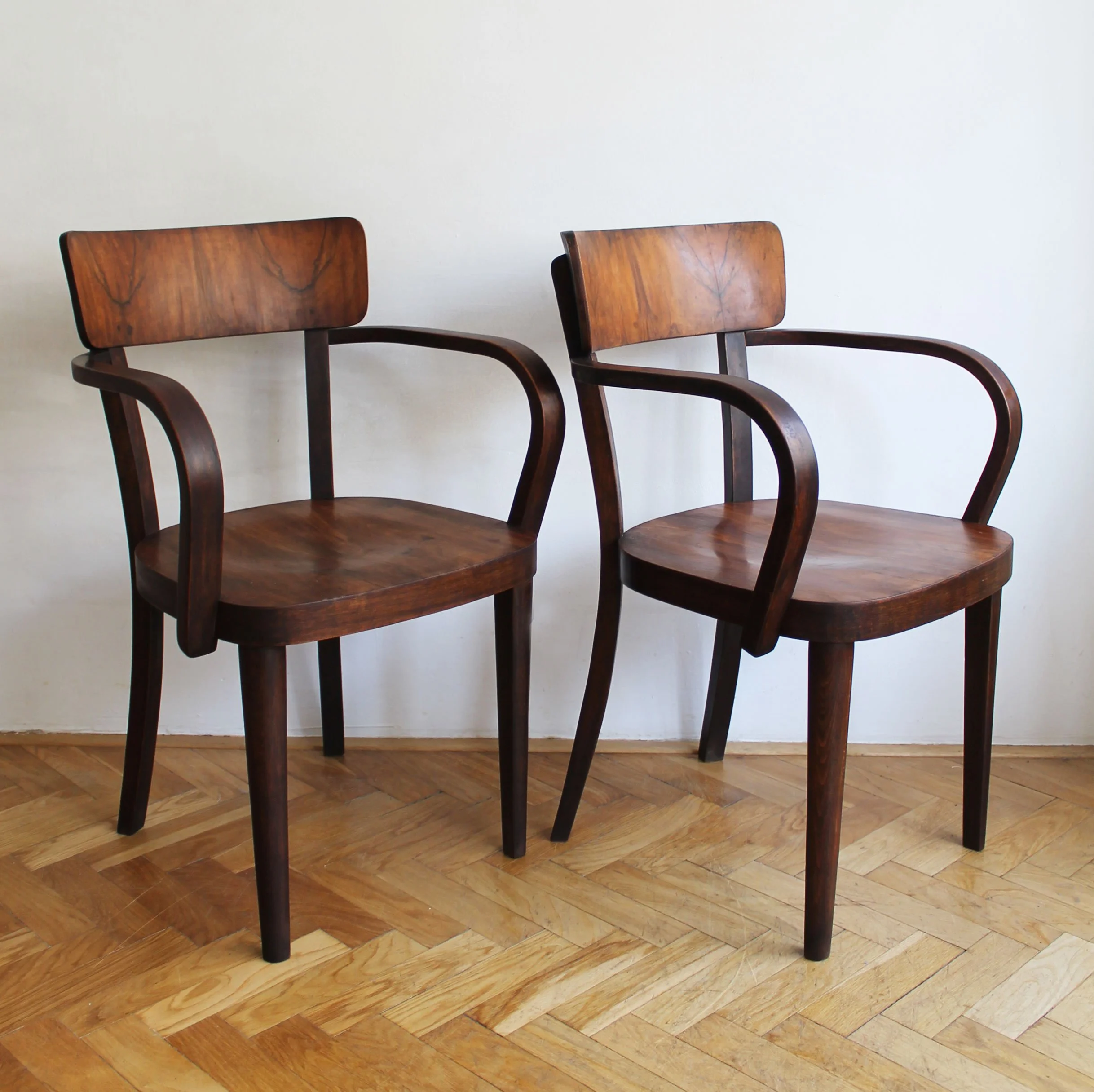 Side profile of bentwood armchair showing elegant silhouette.jpg