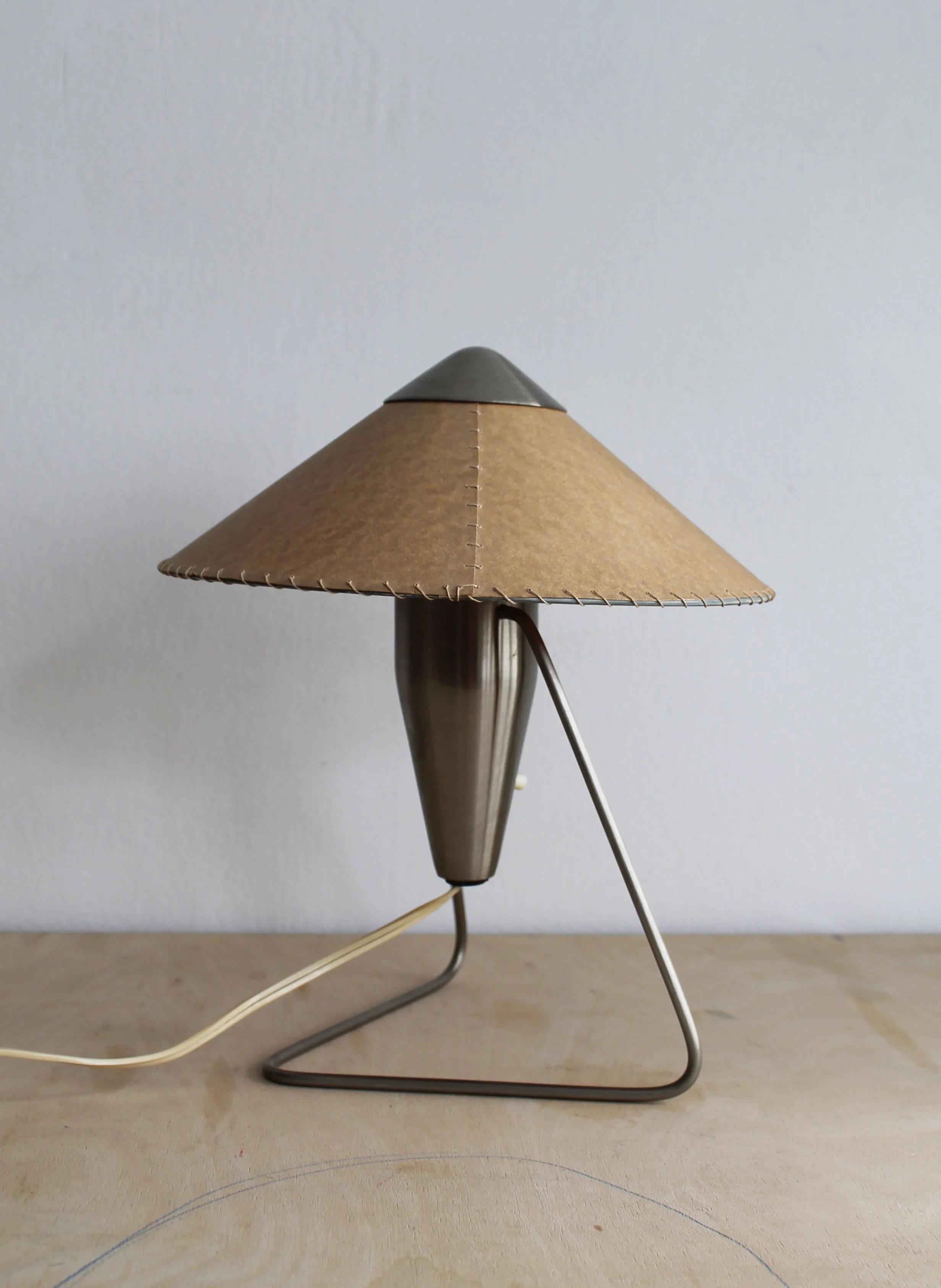 Profile of Číňan lamp showing original stitched parchment shade and metal frame.jpg