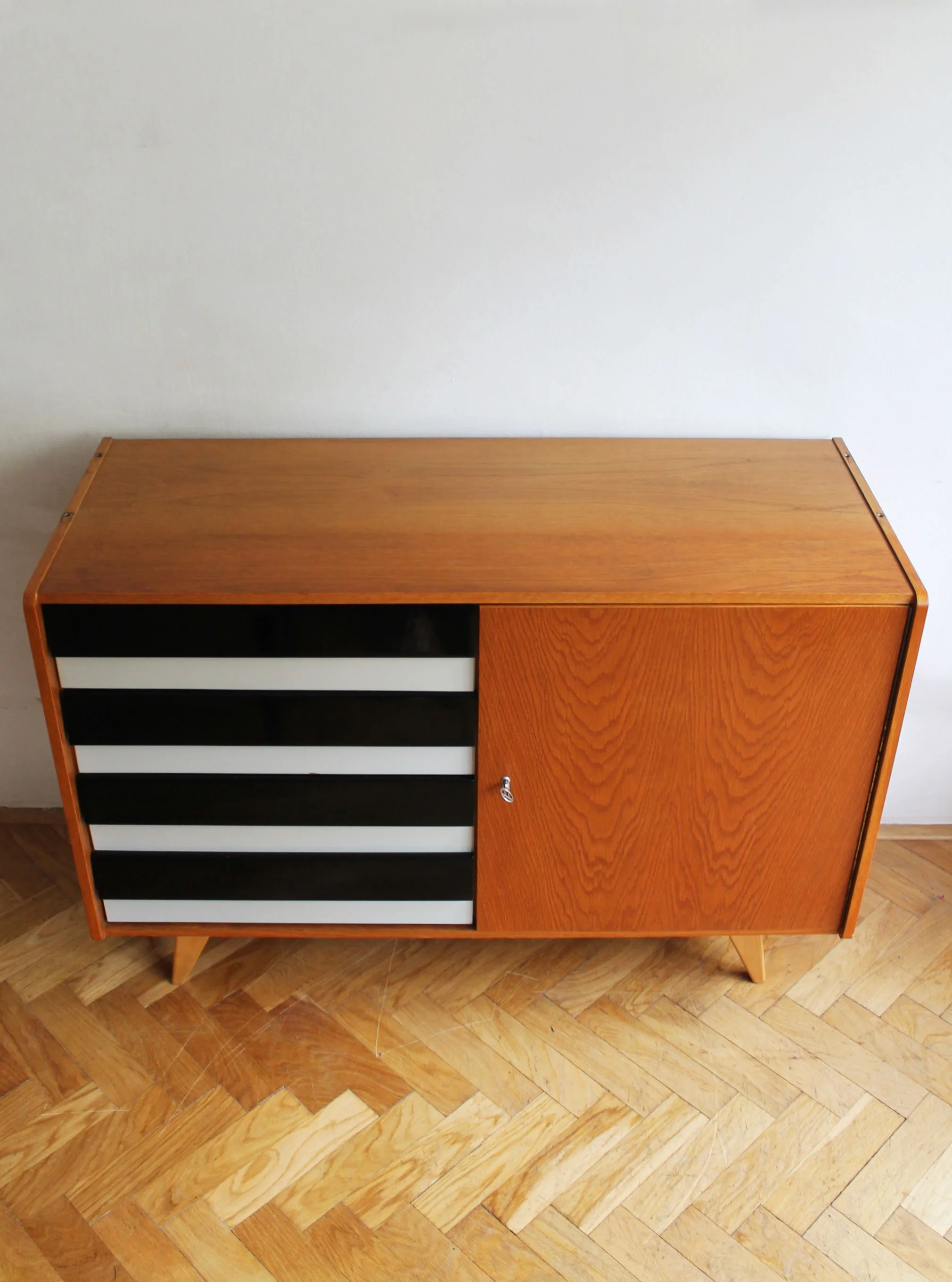 Slightly splayed legs characteristic of Czech Mid-Century furniture.jpg