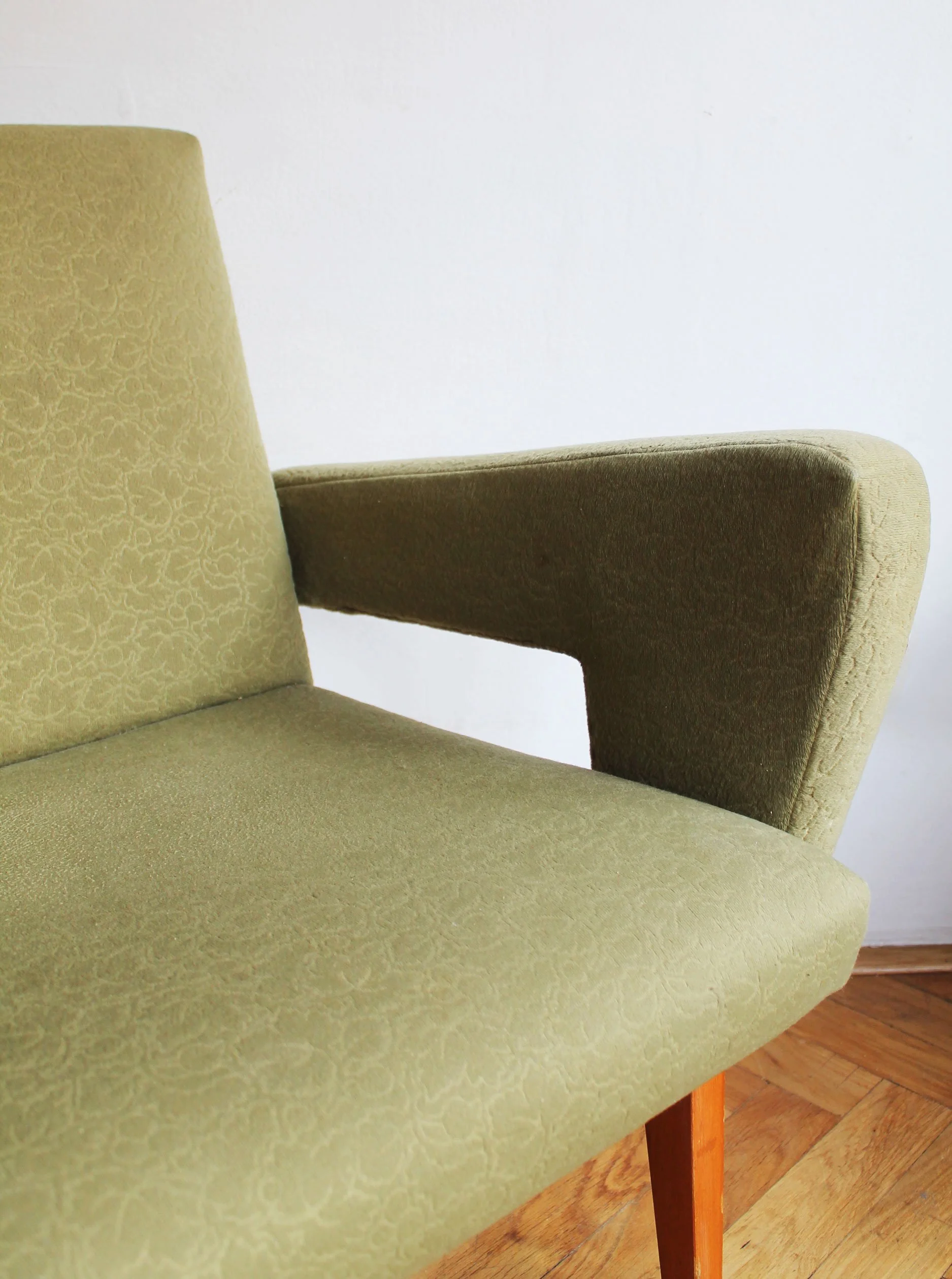 Back view of vintage Jitona armchair with clean modern lines.jpg