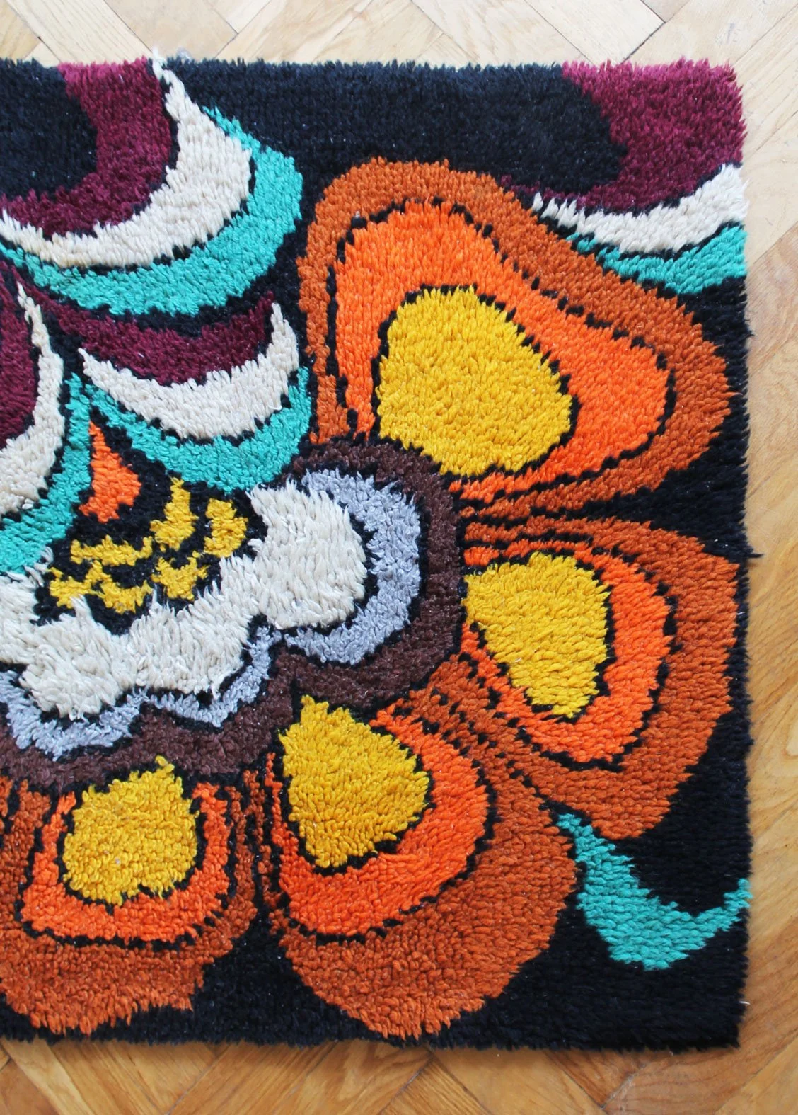 Retro 1970s wool wall hanging with bold floral motif.jpg