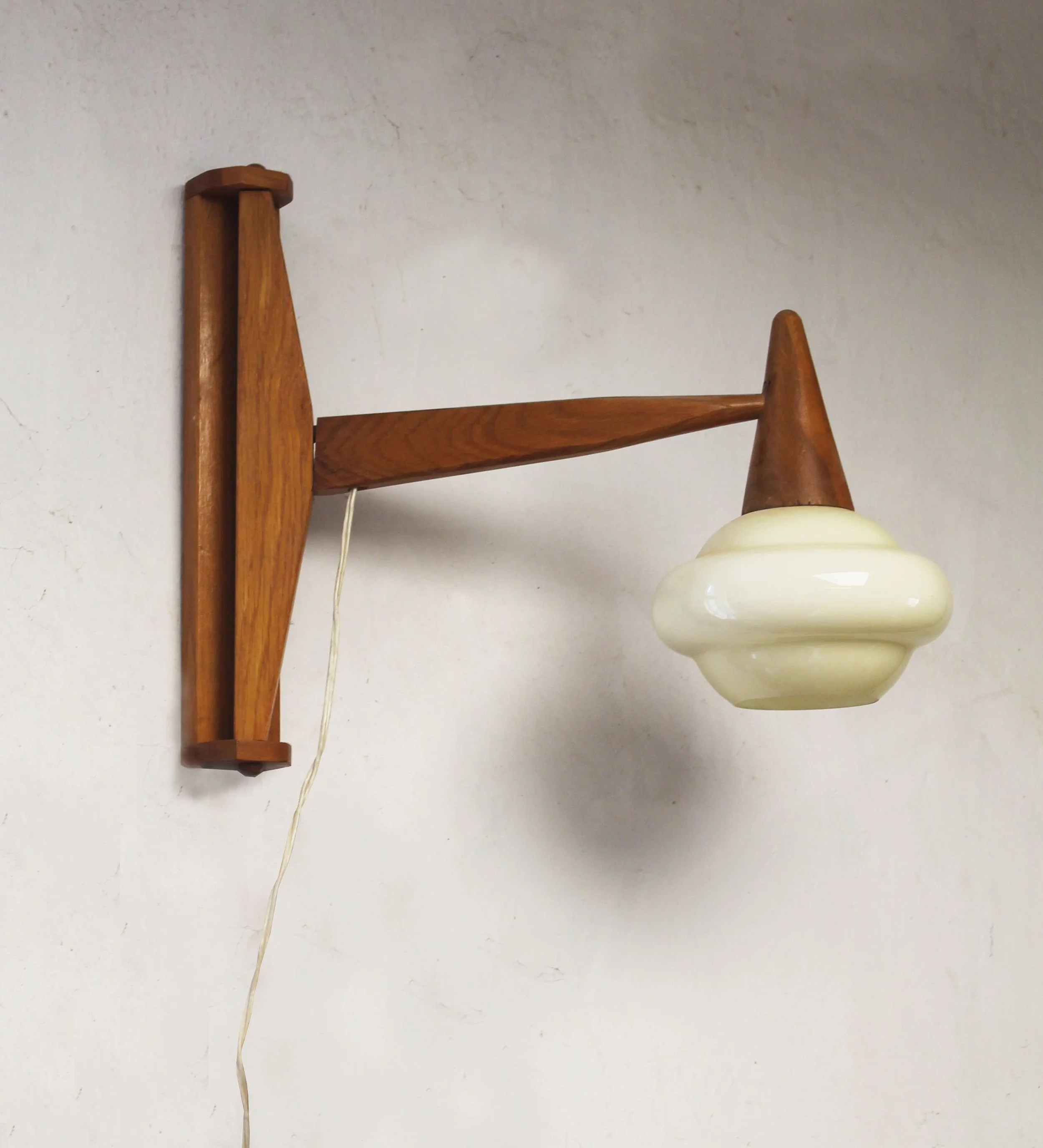 Adjustable 1960s wooden wall light shown with its projecting arm in a horizontal position.jpg