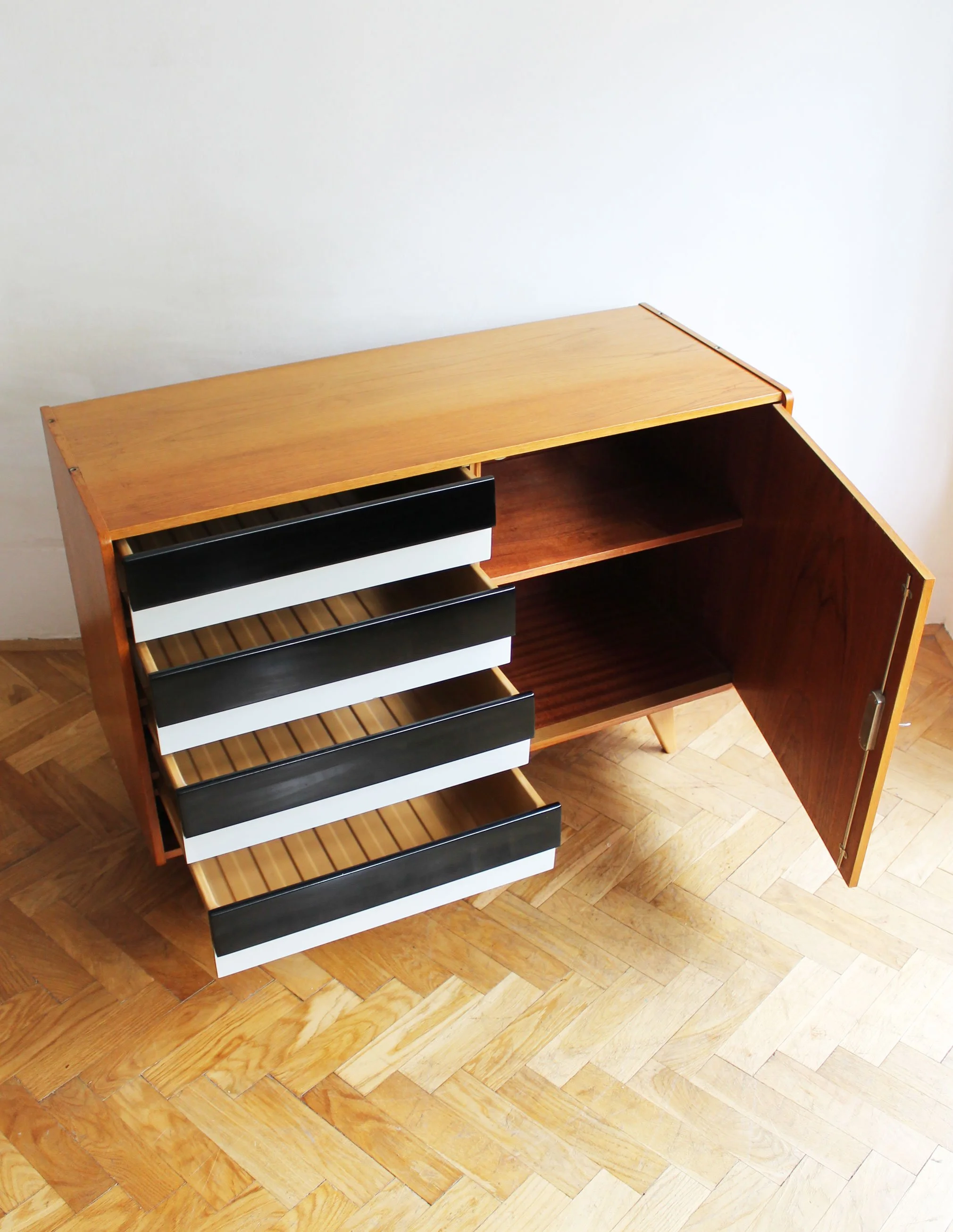 Adjustable shelf inside the original Interiér Praha sideboard.jpg