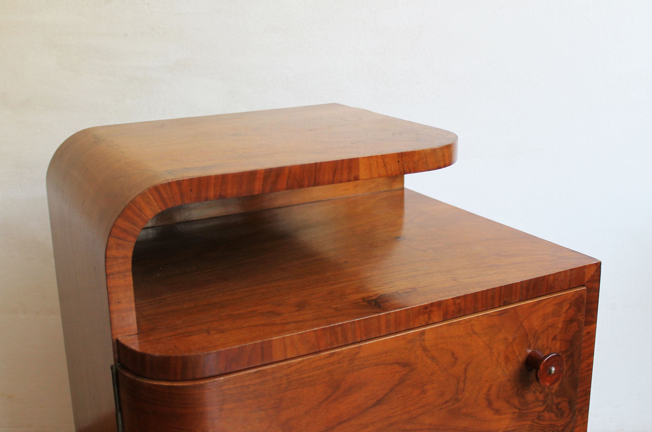 Art Deco cabinet bedside with round handle detail.jpg