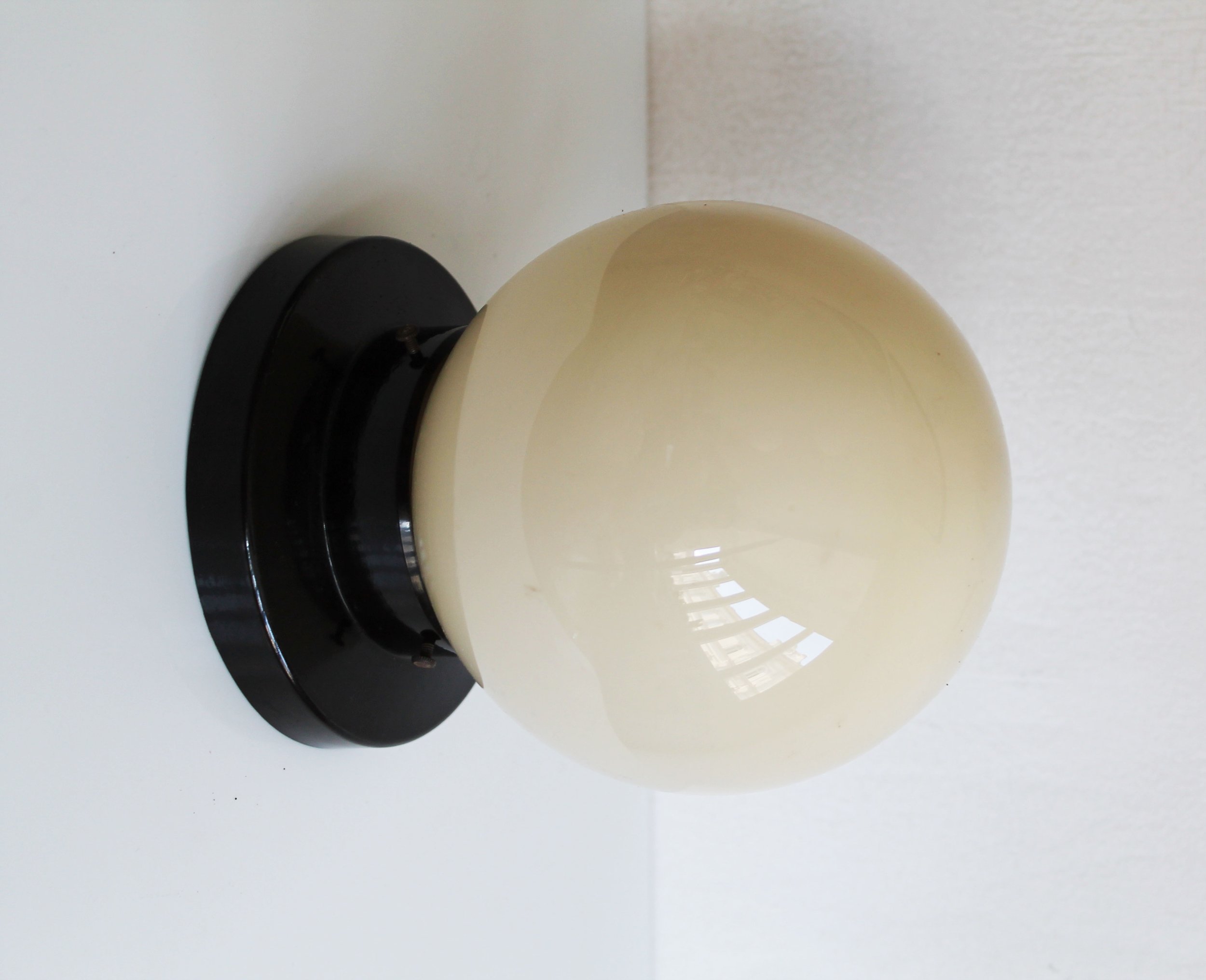 Functionalist ceiling or wall lamp bakelite and milk glass.jpg