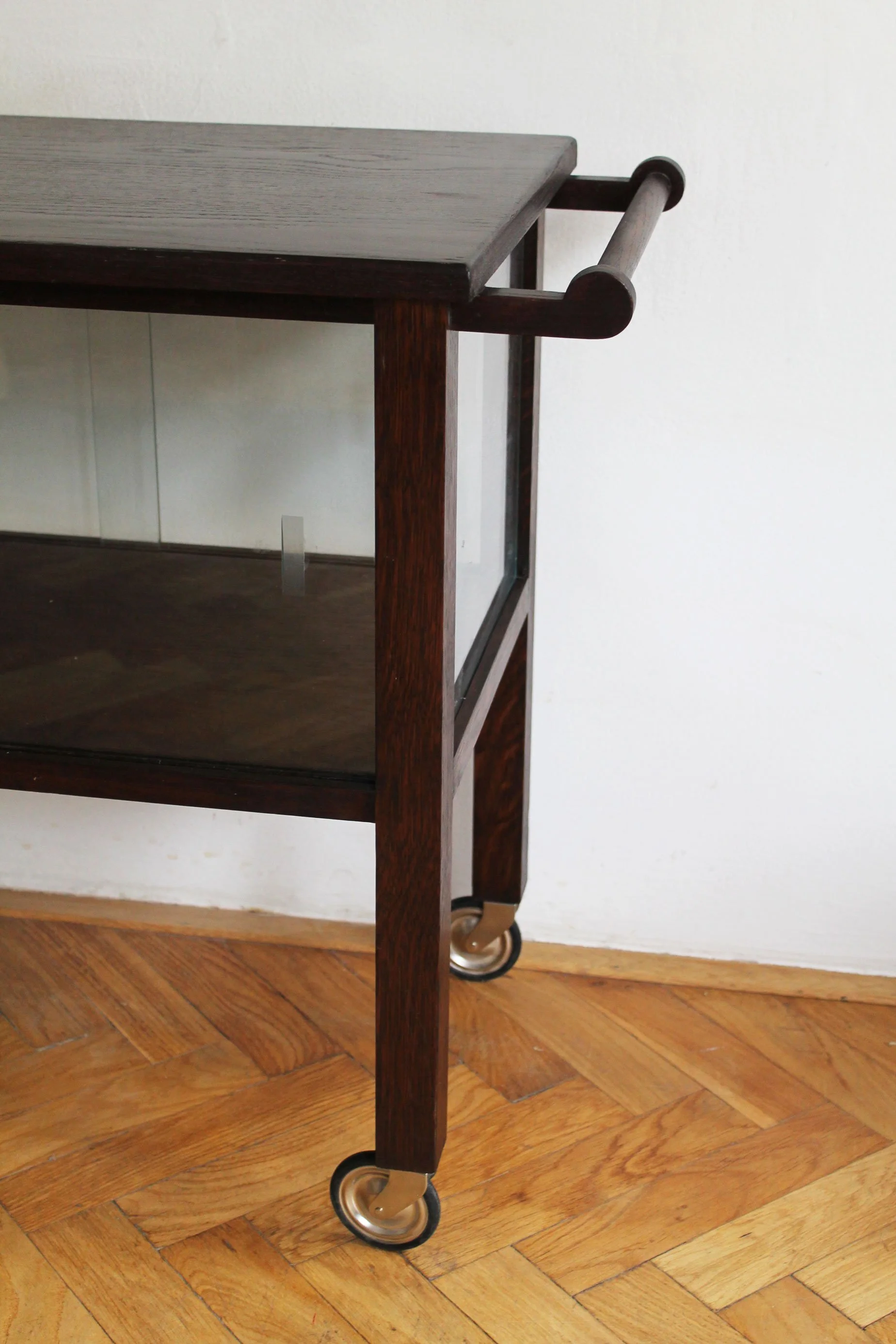 Back view of 1940s vintage bar cart with transparent glass panels.jpg