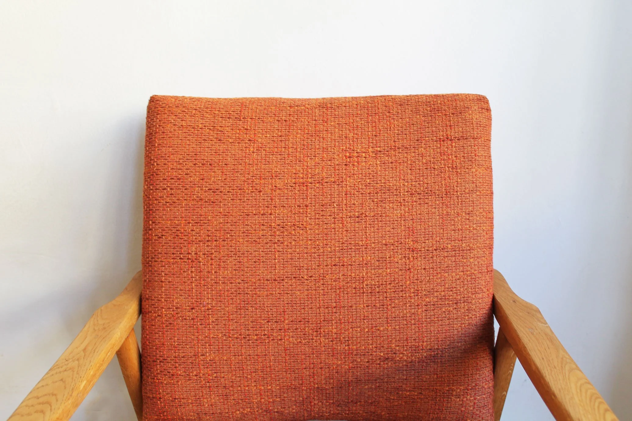 Classic 1960s Czechoslovak armchair with minimalist aesthetic.jpg