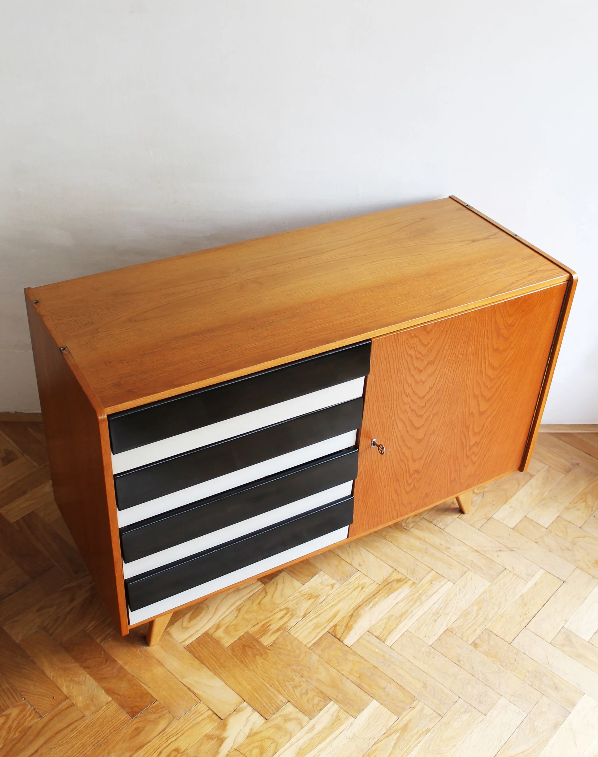 Adjustable shelf inside the original Interiér Praha sideboard.jpg